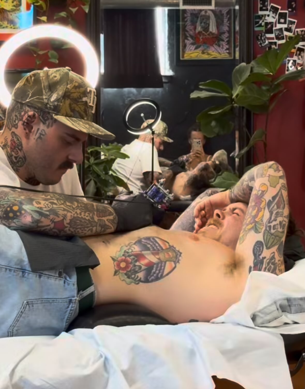 Umbrella and flowers American traditional tattoo on the chest by Jared Allen, Saint Petersburg, Florida