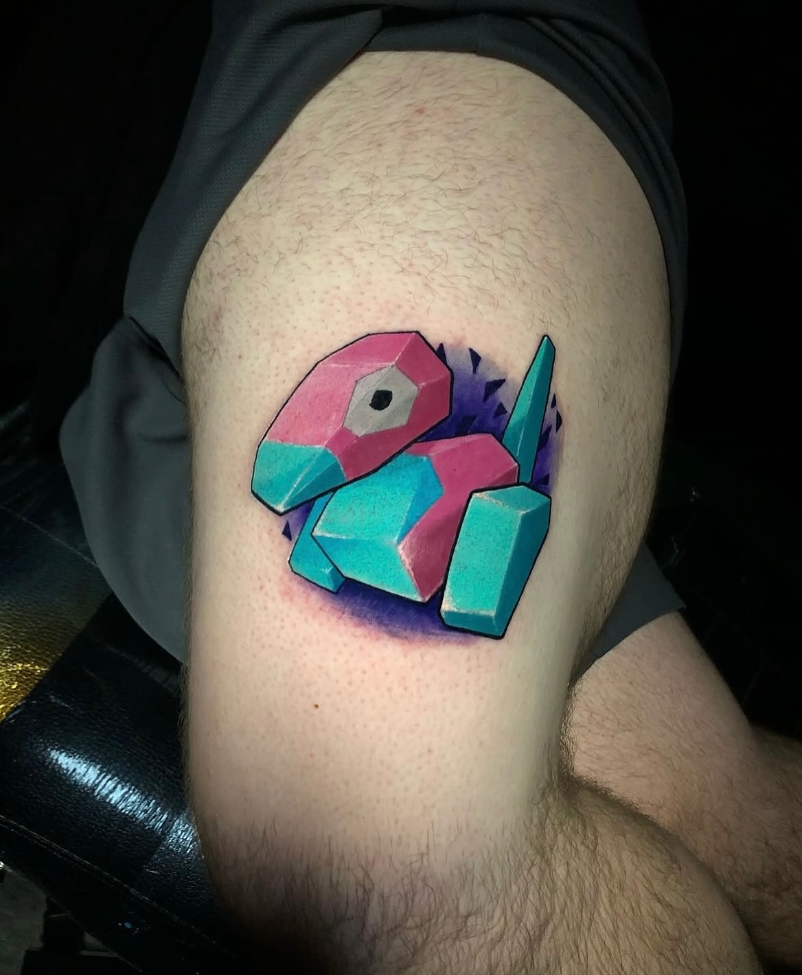 Geometric fish geometric tattoo on the thigh by Frank Miller