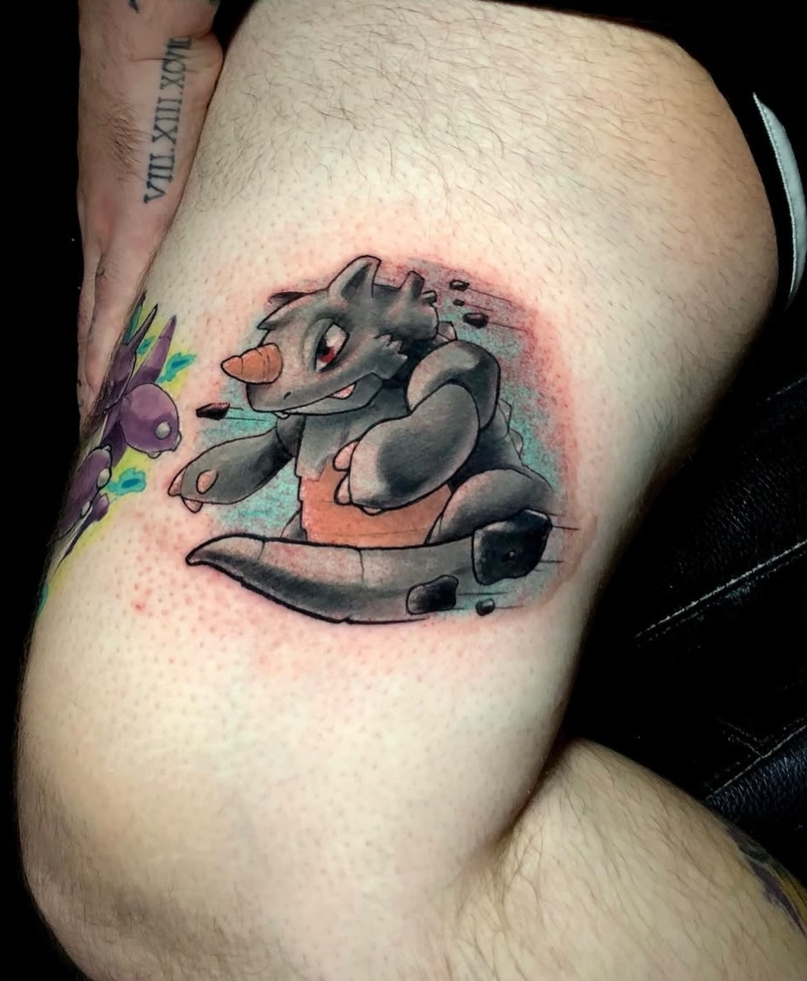 Dragon watercolor tattoo on the thigh by Frank Miller