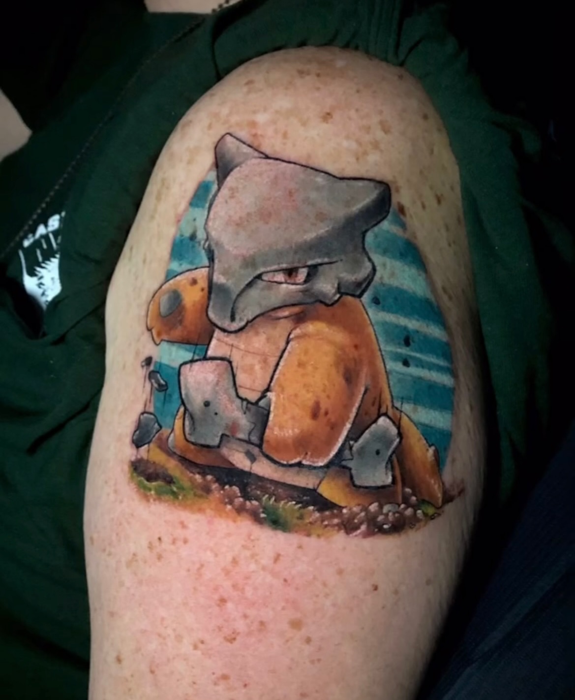 Rock rattle dotwork tattoo on the forearm by Frank Miller