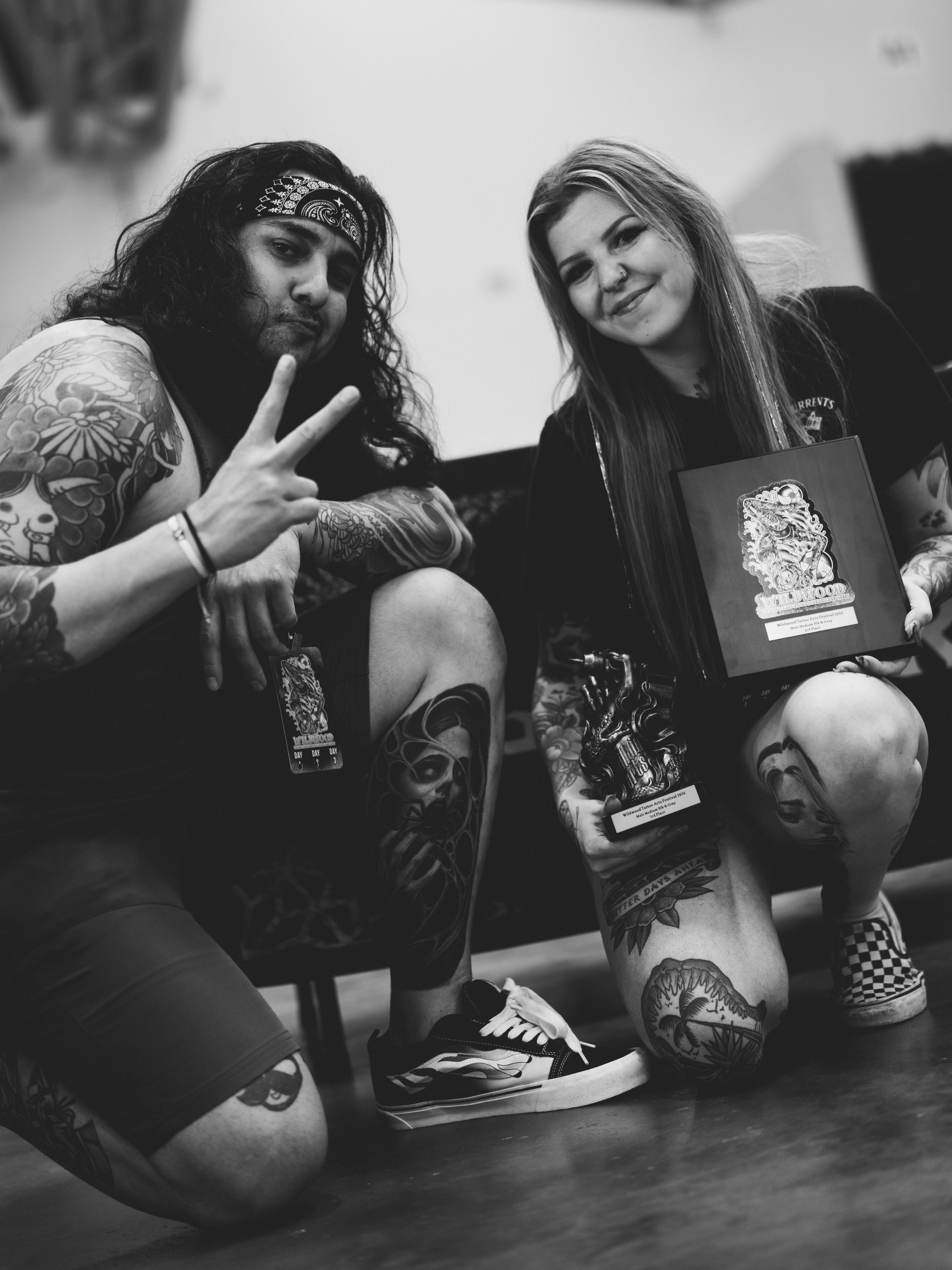 Tattooed couple black and grey tattoo by Andres Flores