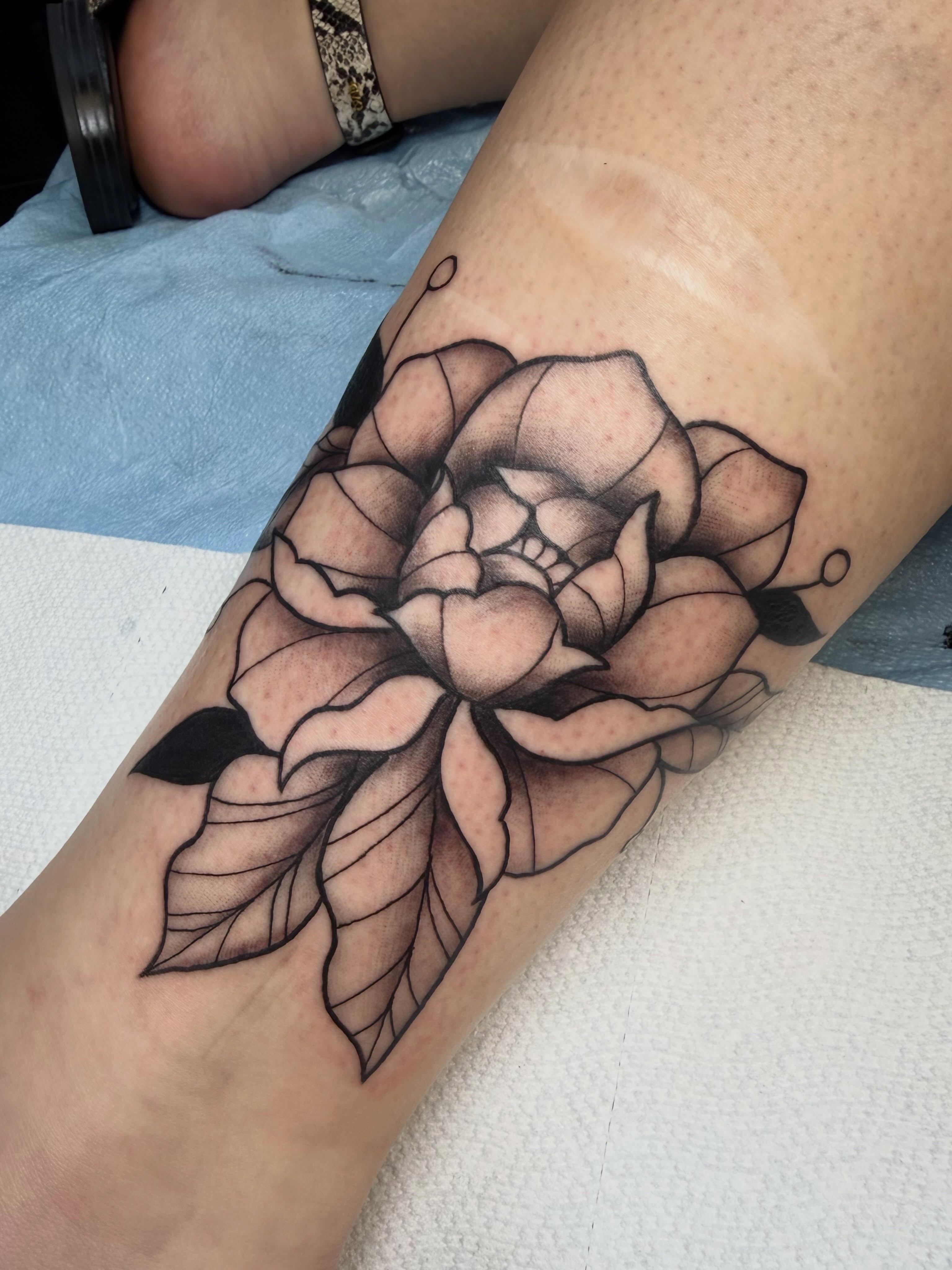 Flower black and grey tattoo on the forearm by Bri ⚡️✨