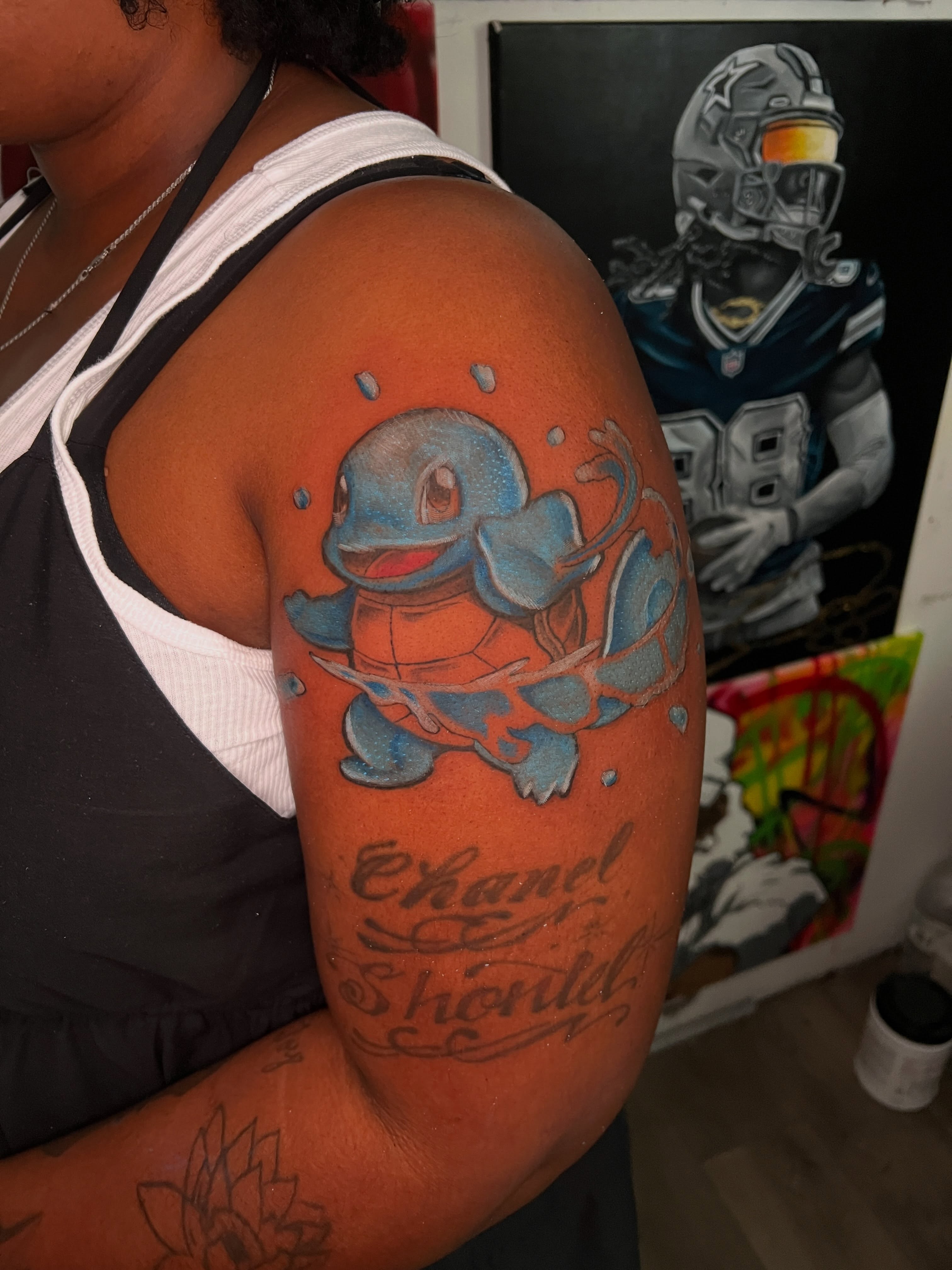 Squirtle dotwork tattoo on the upper arm by Justx4rt