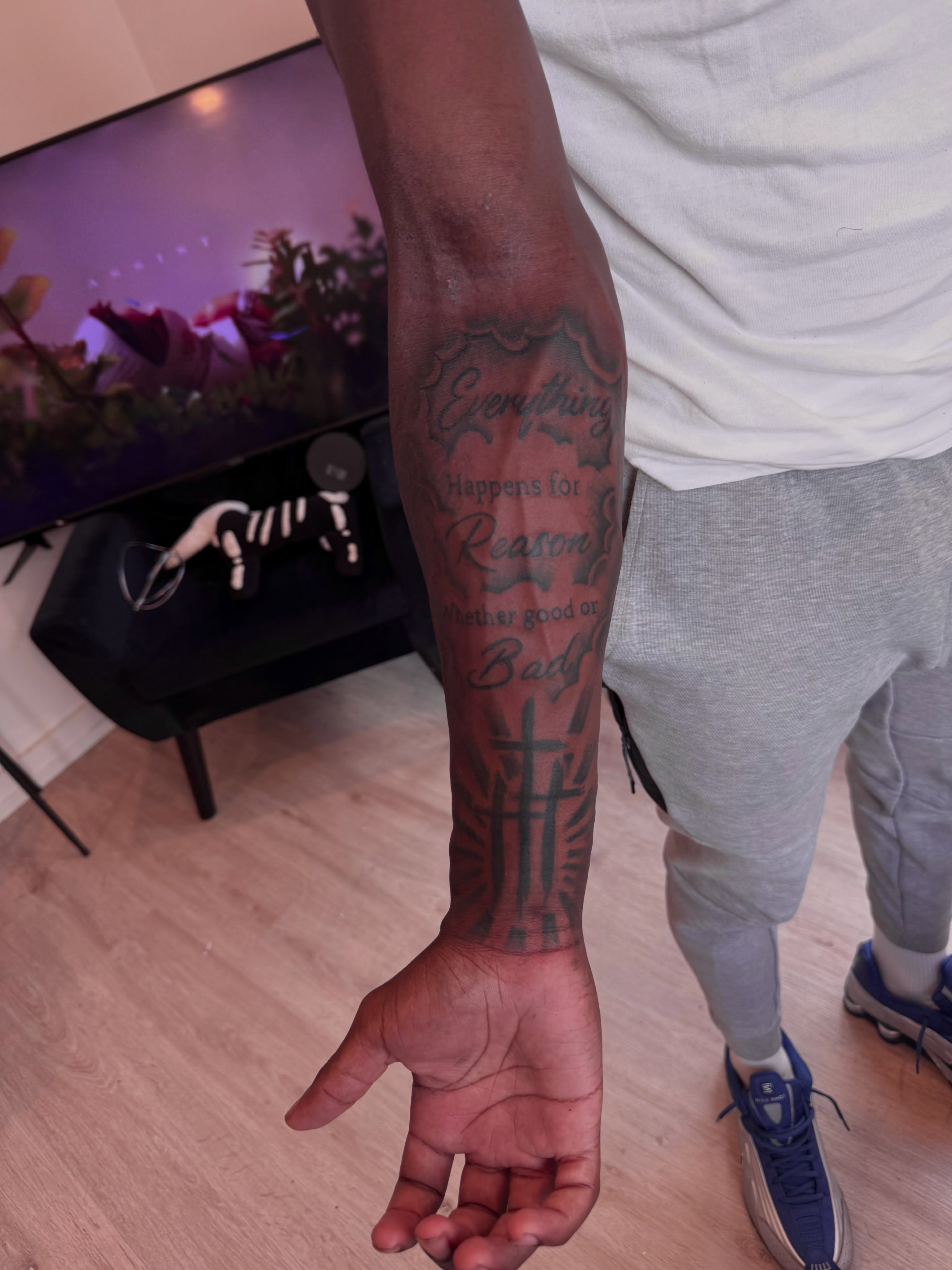 Cross and inspirational text black and grey tattoo on the forearm by inkedbylii, Philadelphia, Pennsylvania