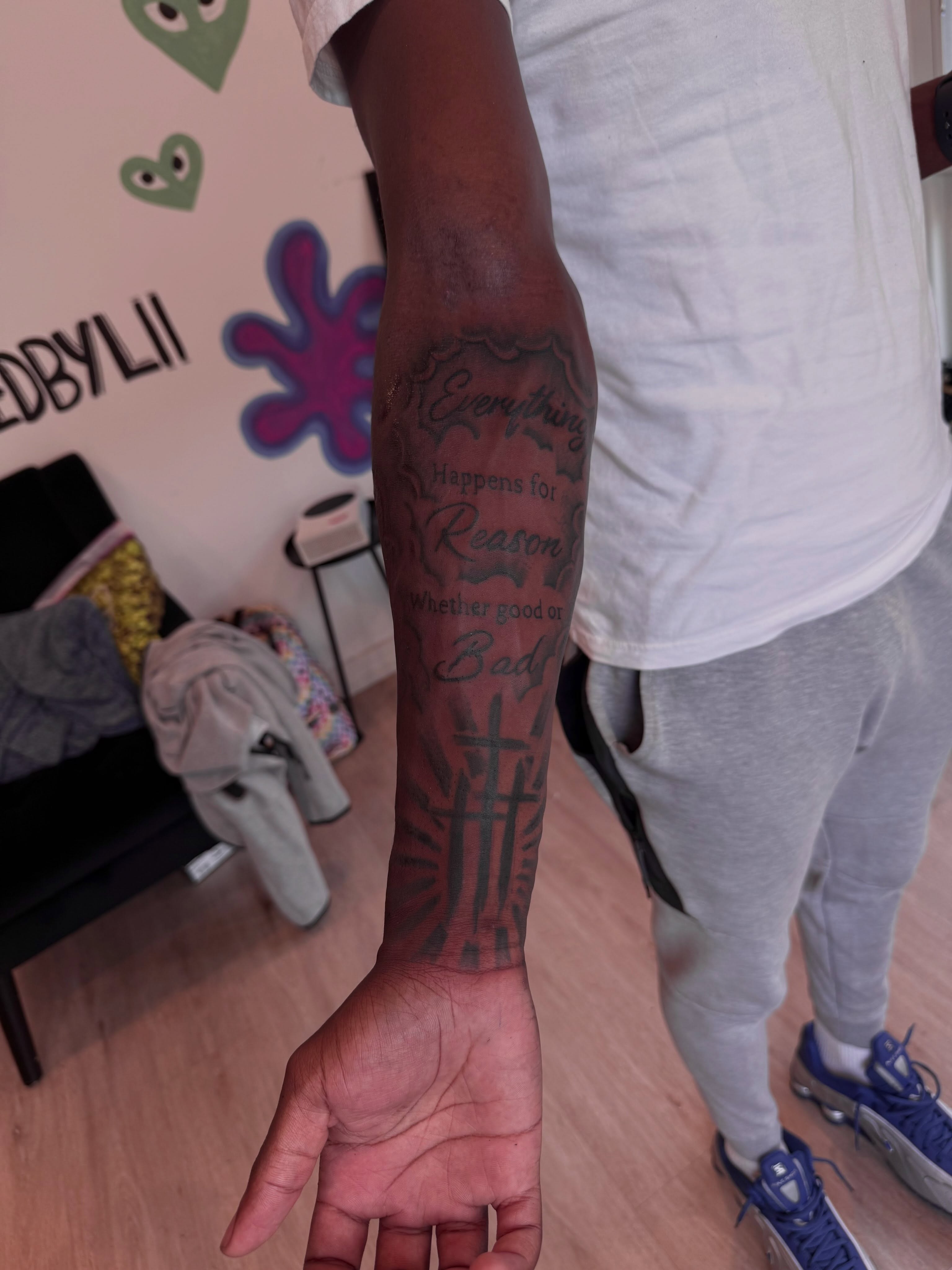 Cross and inspirational text black and grey tattoo on the forearm by inkedbylii, Philadelphia, Pennsylvania