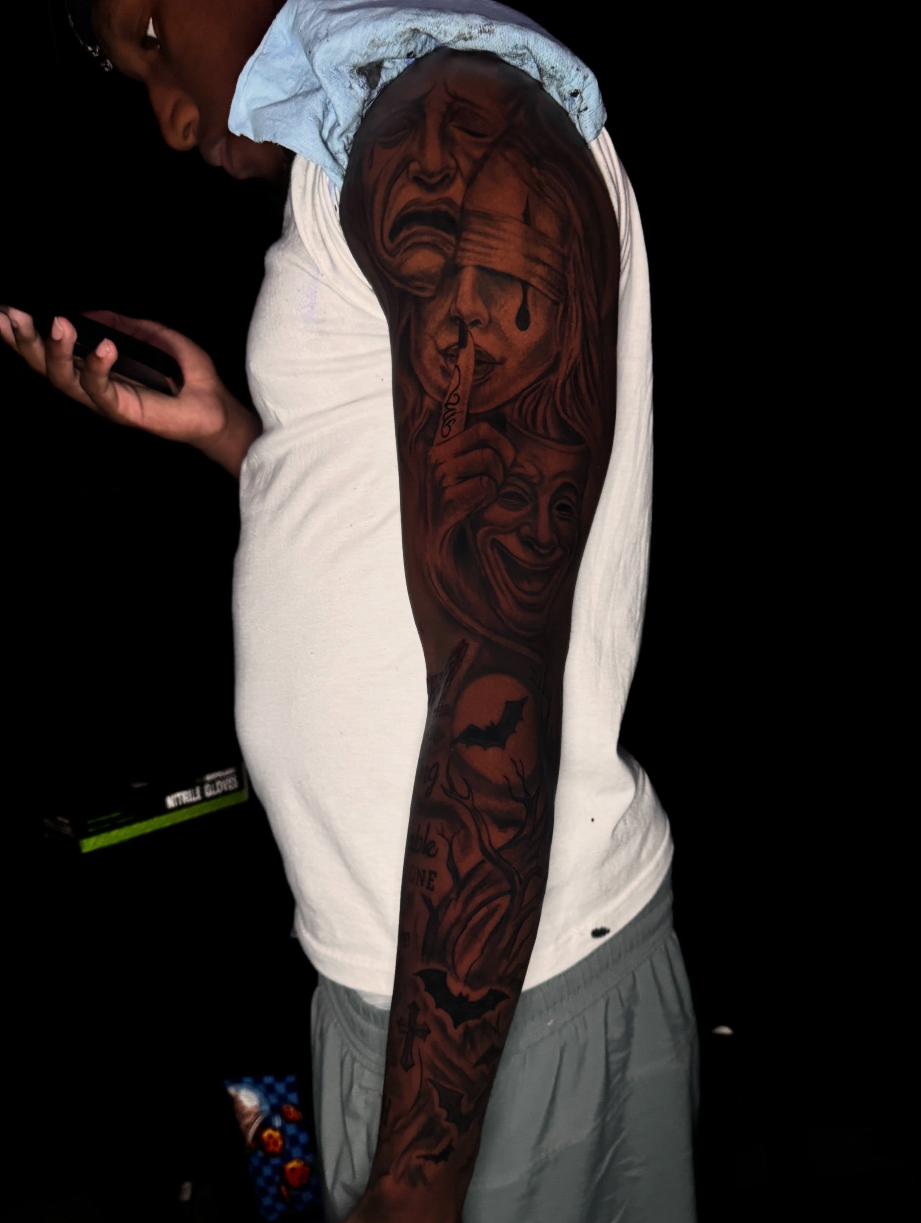 Mask and woman black and grey tattoo on the forearm by dallas tattoo artist, Duncanville, Texas