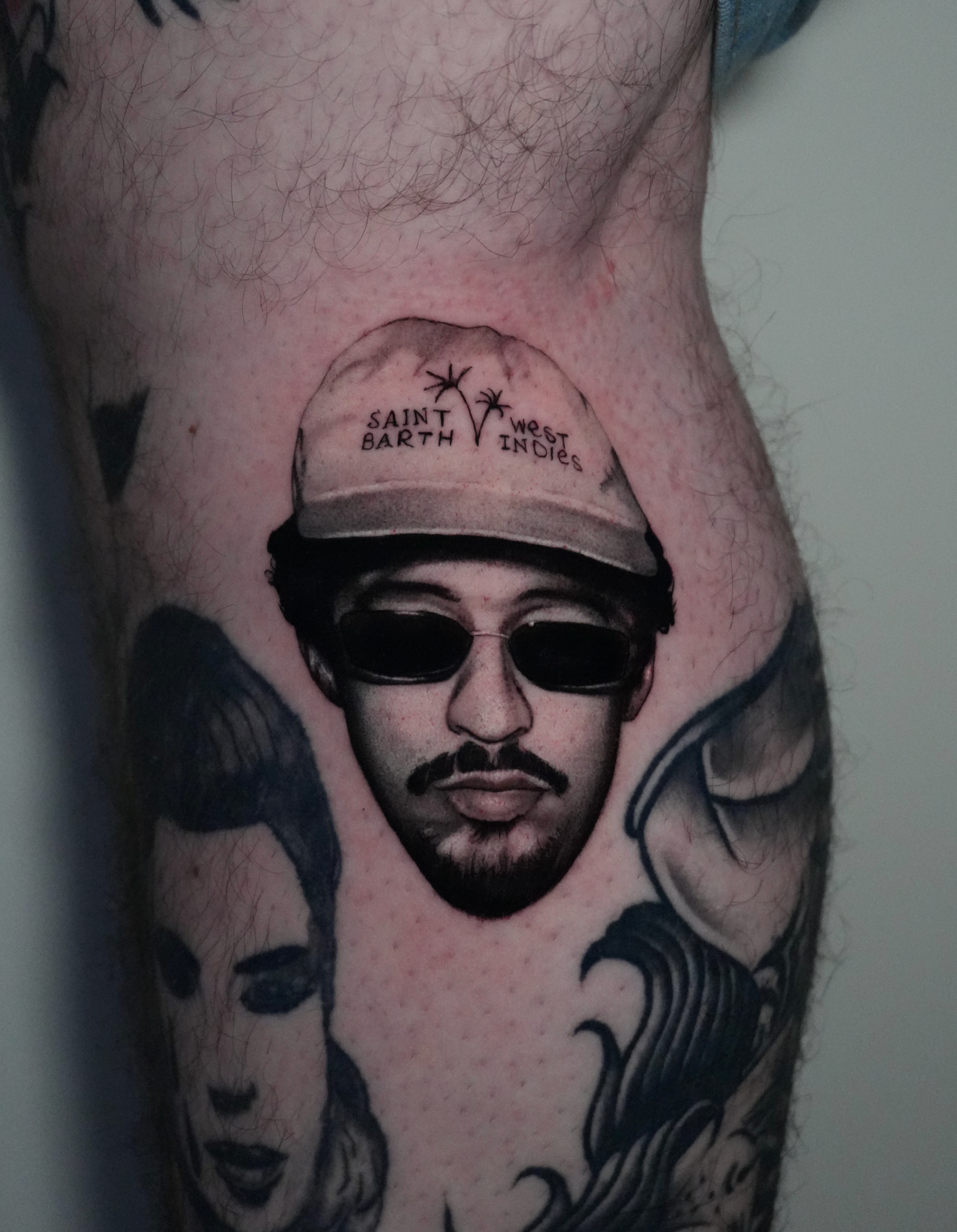 Portrait with cap realism tattoo on the thigh by Giovanni Rodriguez, Eastpointe, Michigan