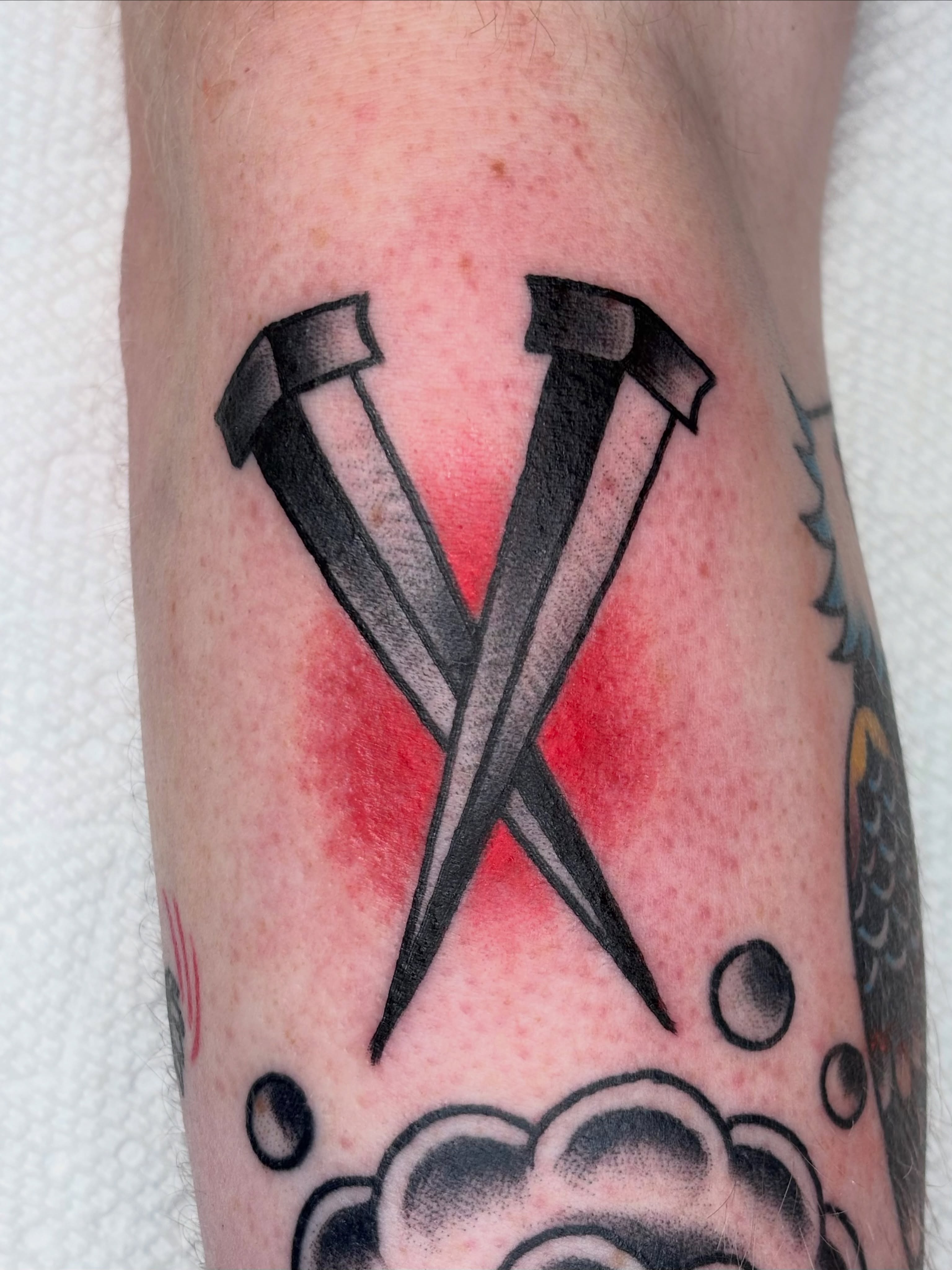 Crossed nails black and grey tattoo on the forearm by ★ ★ ★ Matt Reinstone ★ ★ ★