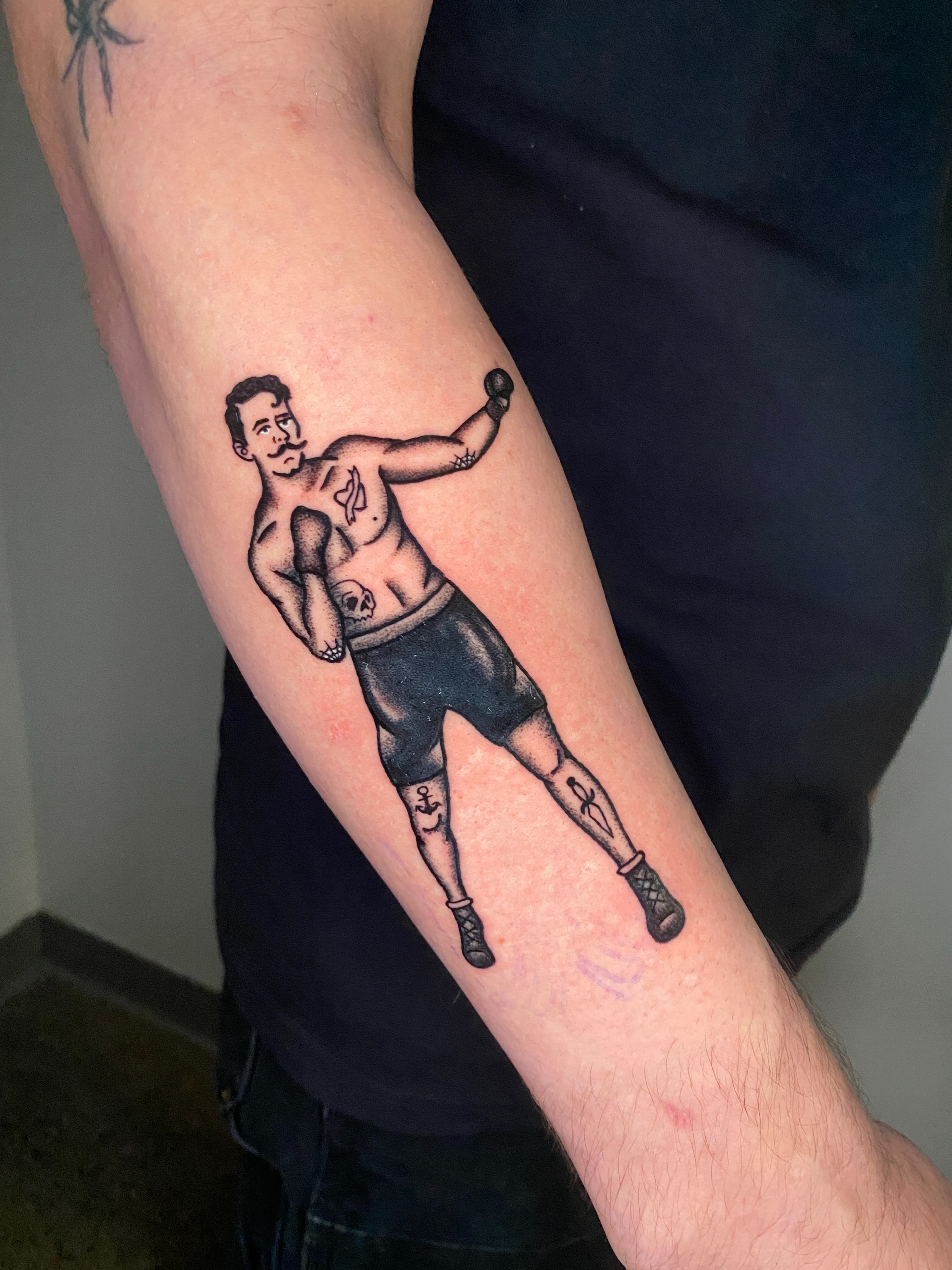 Boxing man American traditional tattoo on the forearm by Aidan Leery, Portland, Oregon