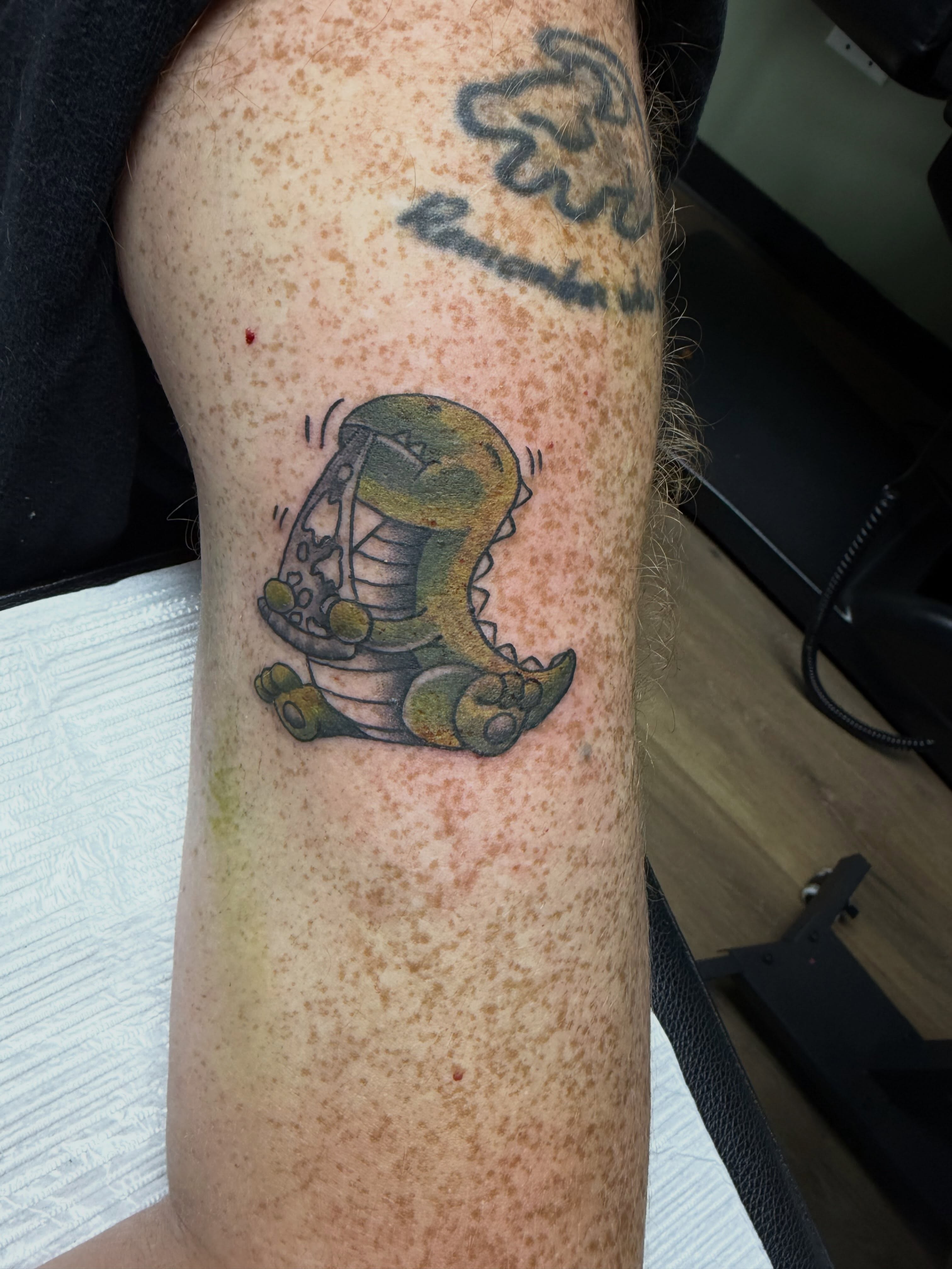 Alligator American traditional tattoo on the forearm by Tina Gregg, North Ridgeville, Ohio