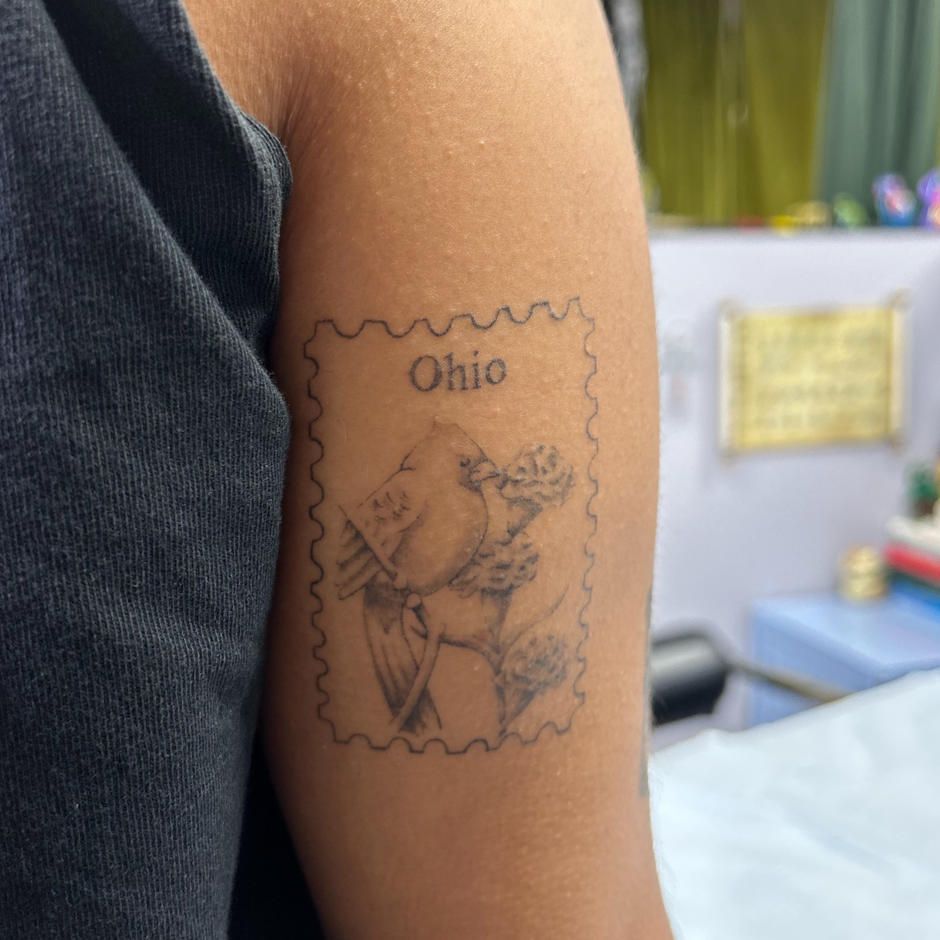 Postage stamp black and grey tattoo on the forearm by Natalie Johnson, Minneapolis, Minnesota