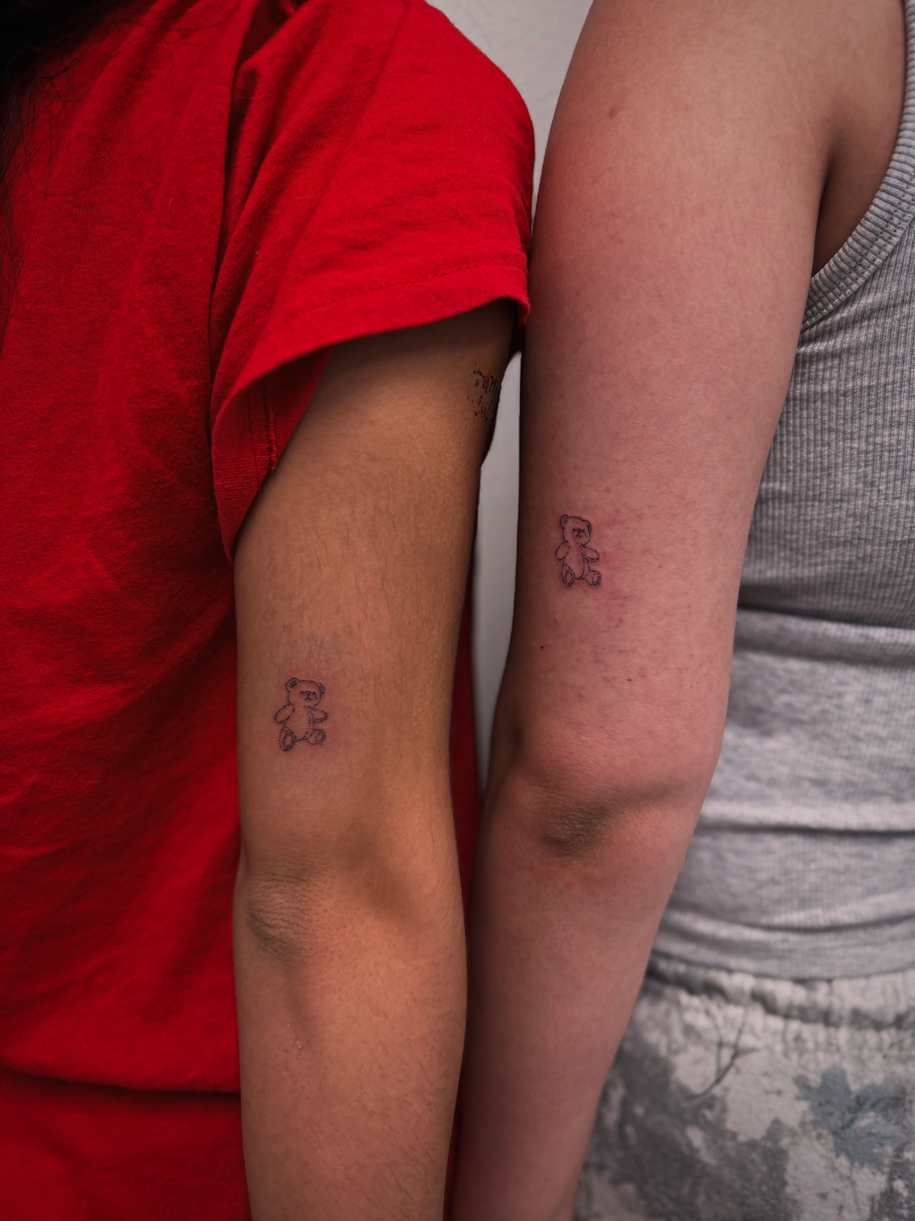 Teddy bear black and grey tattoo on the forearm by Taylor Johnson