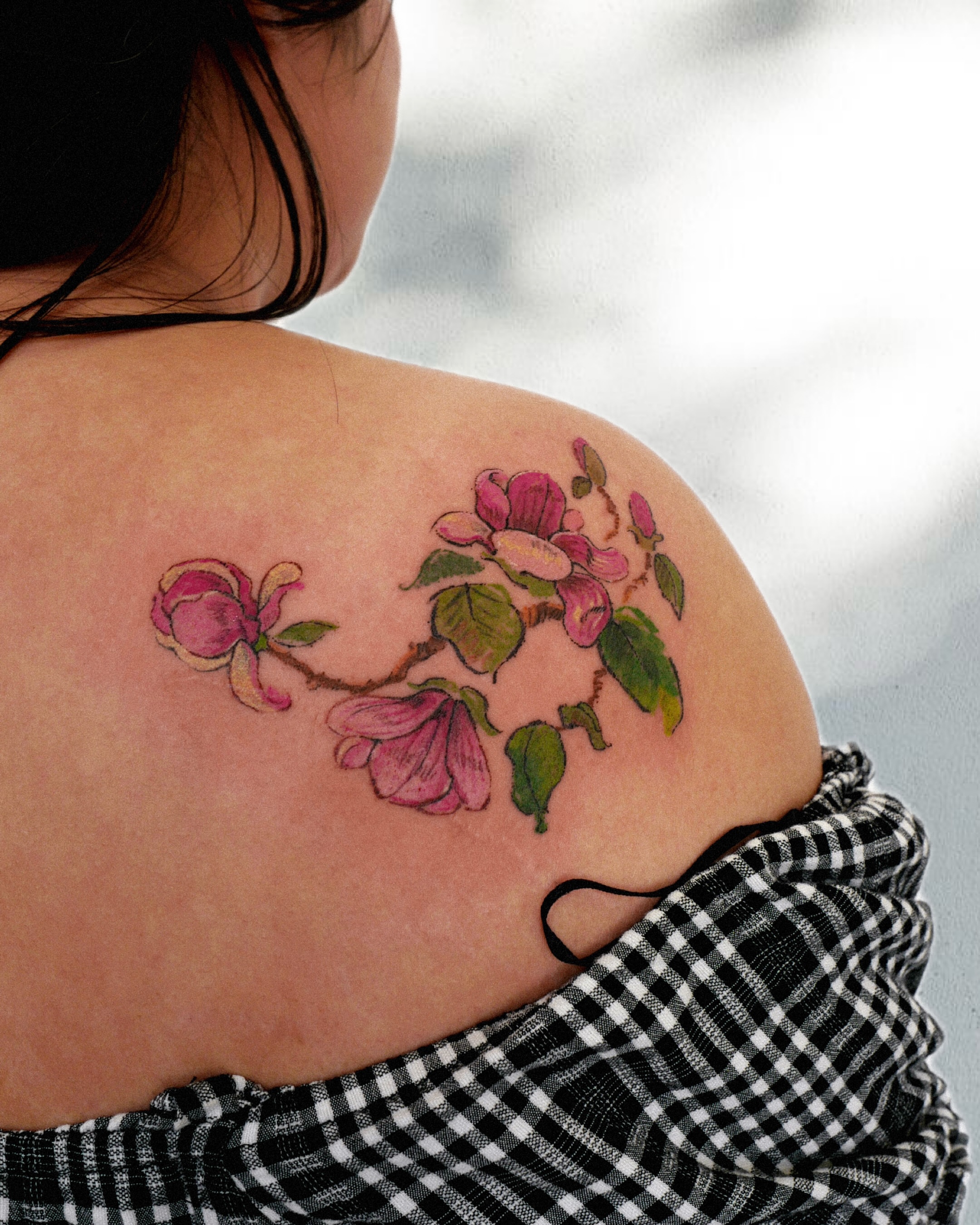 Flower branch realism tattoo on the shoulder by dahye lee