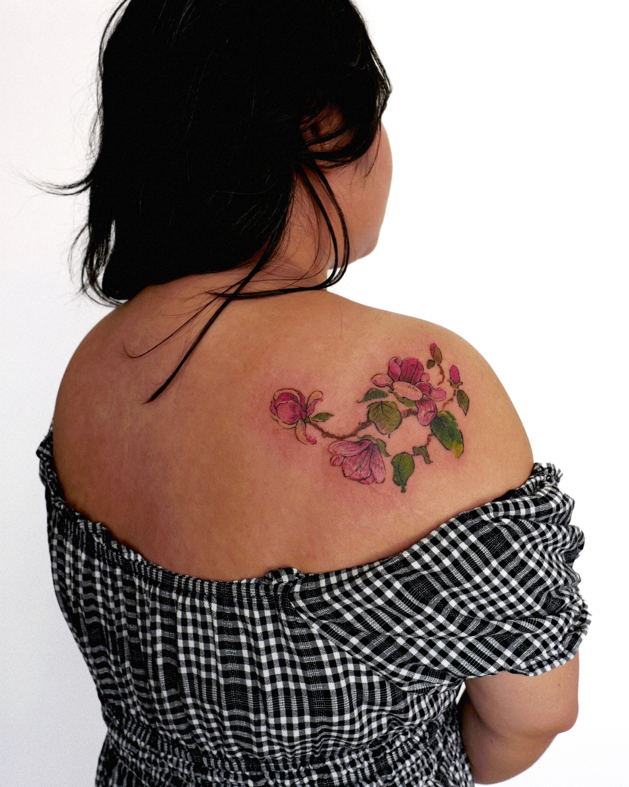 Cherry blossoms realism tattoo on the shoulder by dahye lee
