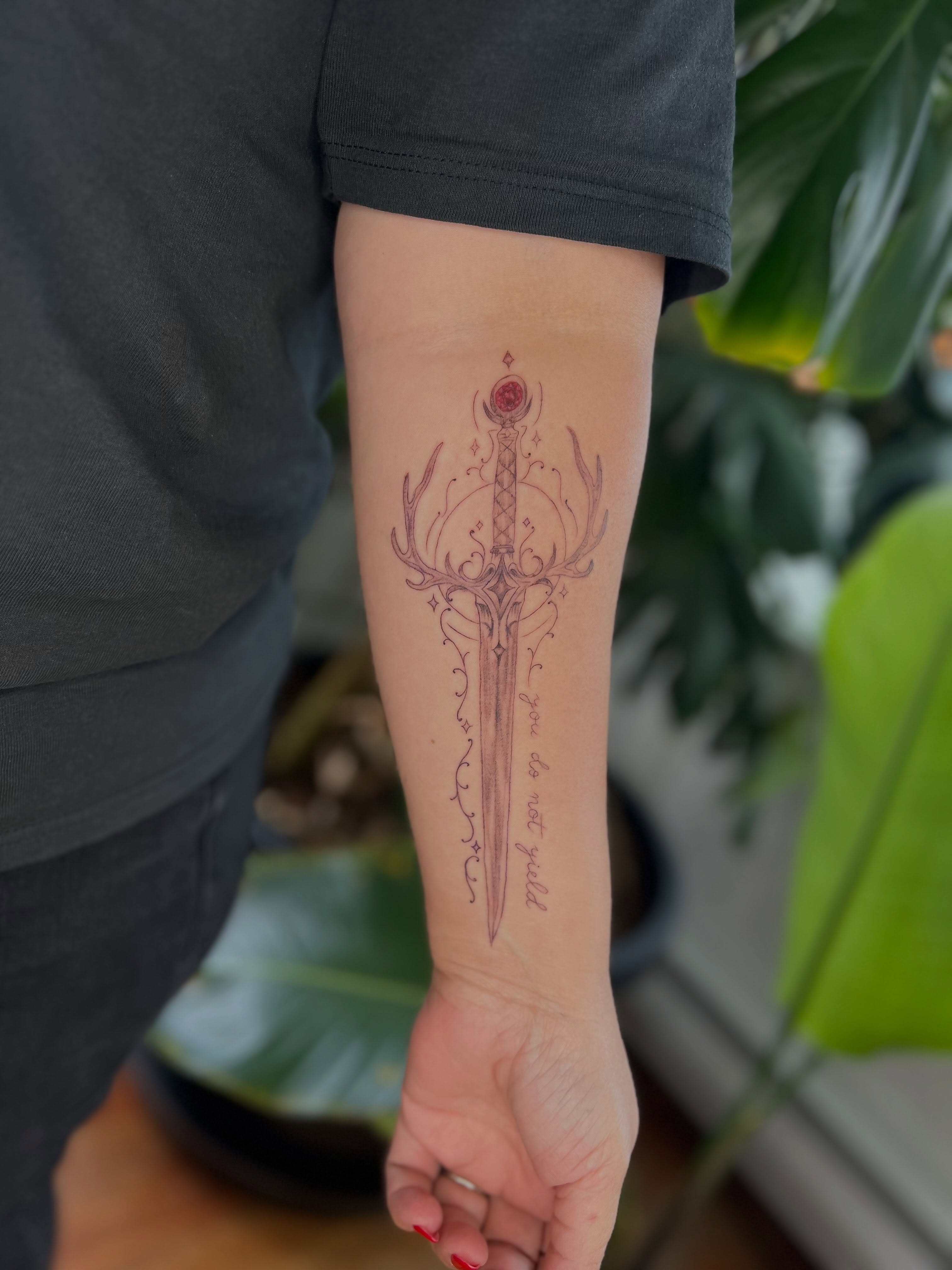 Sword ornamental tattoo on the forearm by Jordi WA Tacoma Tattooer
