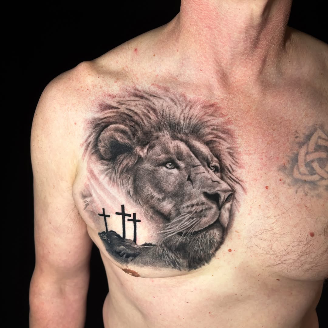 Lion realism tattoo on the chest by Sarah Sacco