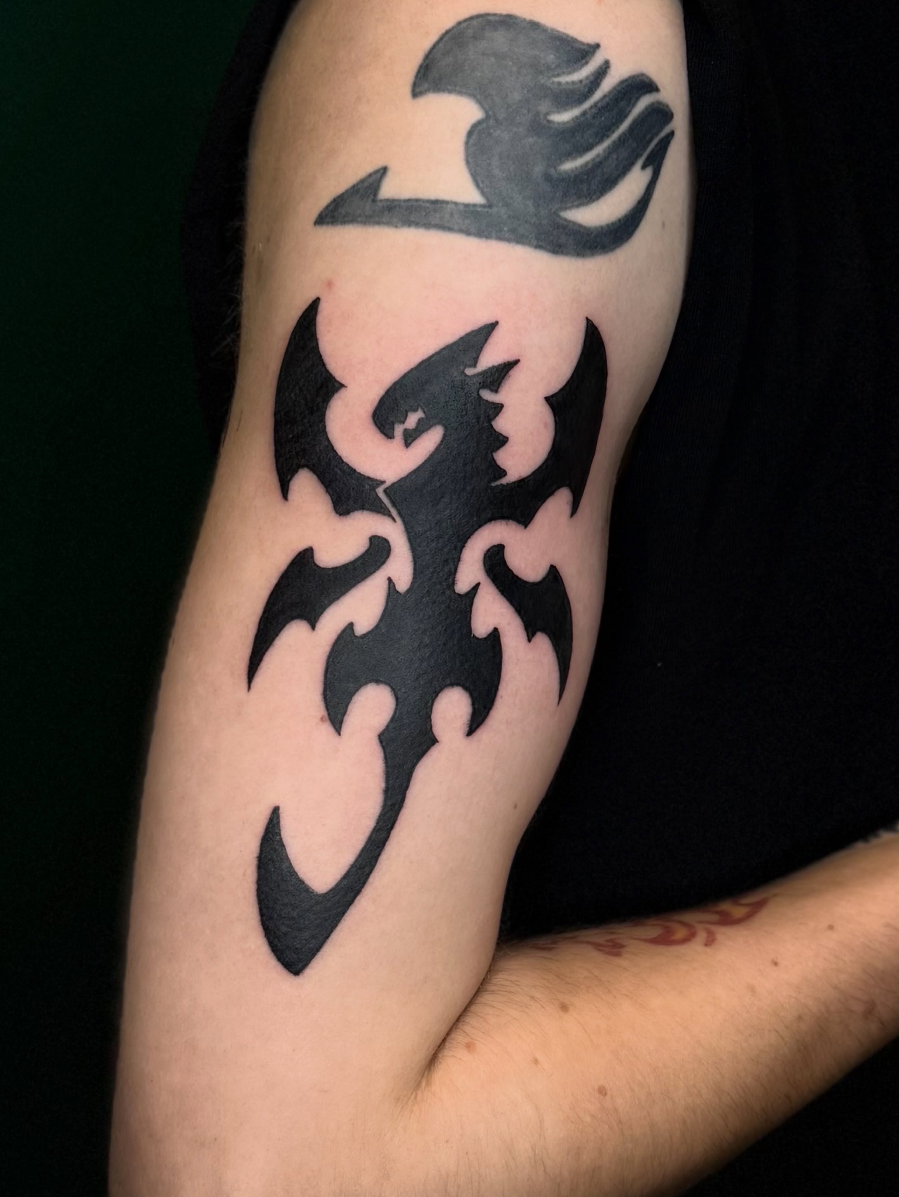 Bat tribal tattoo on the forearm by Jennifer Contreras