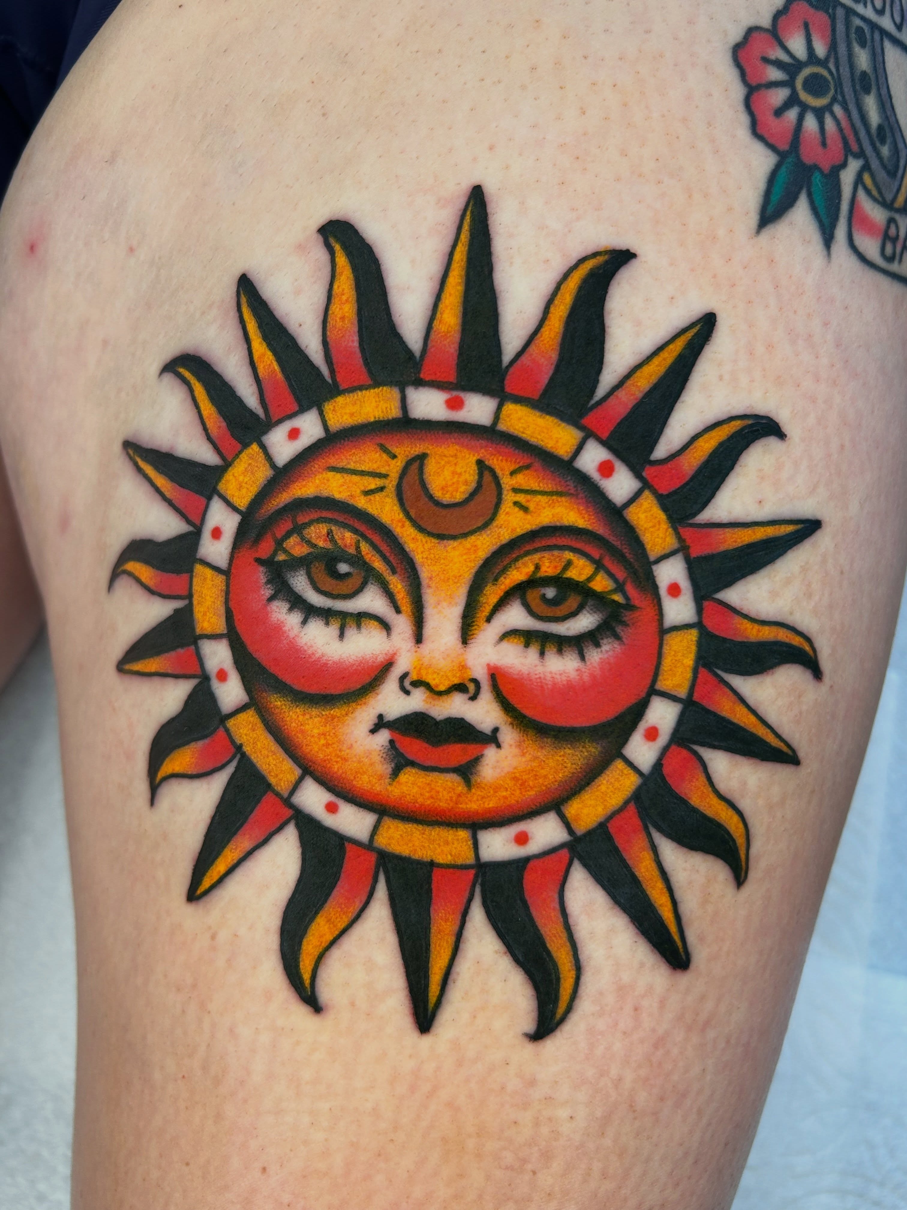 Sun American traditional tattoo on the thigh by β π€ππ©π¦π©π’π β± β
