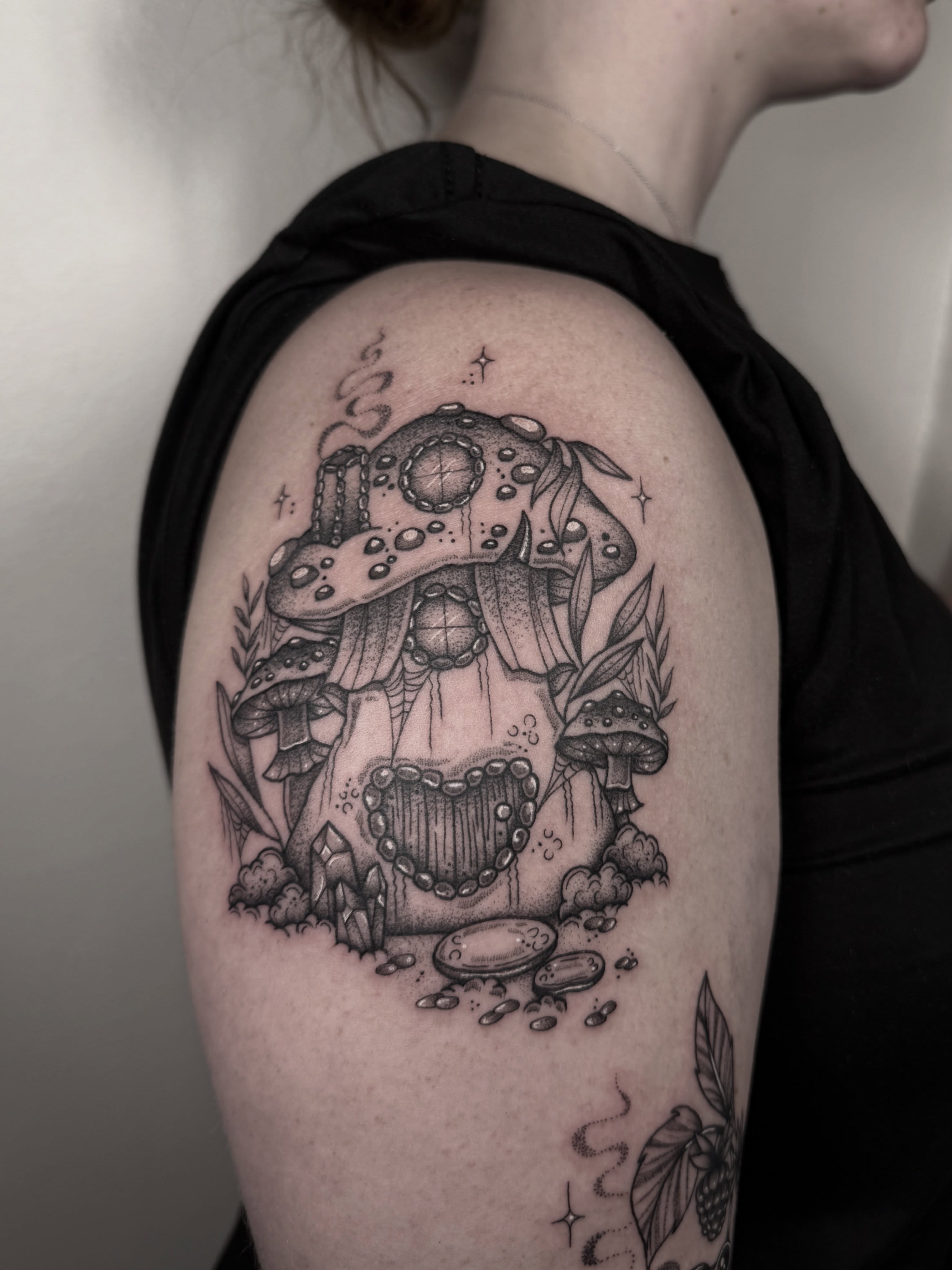Mushroom and harp dotwork tattoo on the shoulder by Mara Flores βπΛβ§