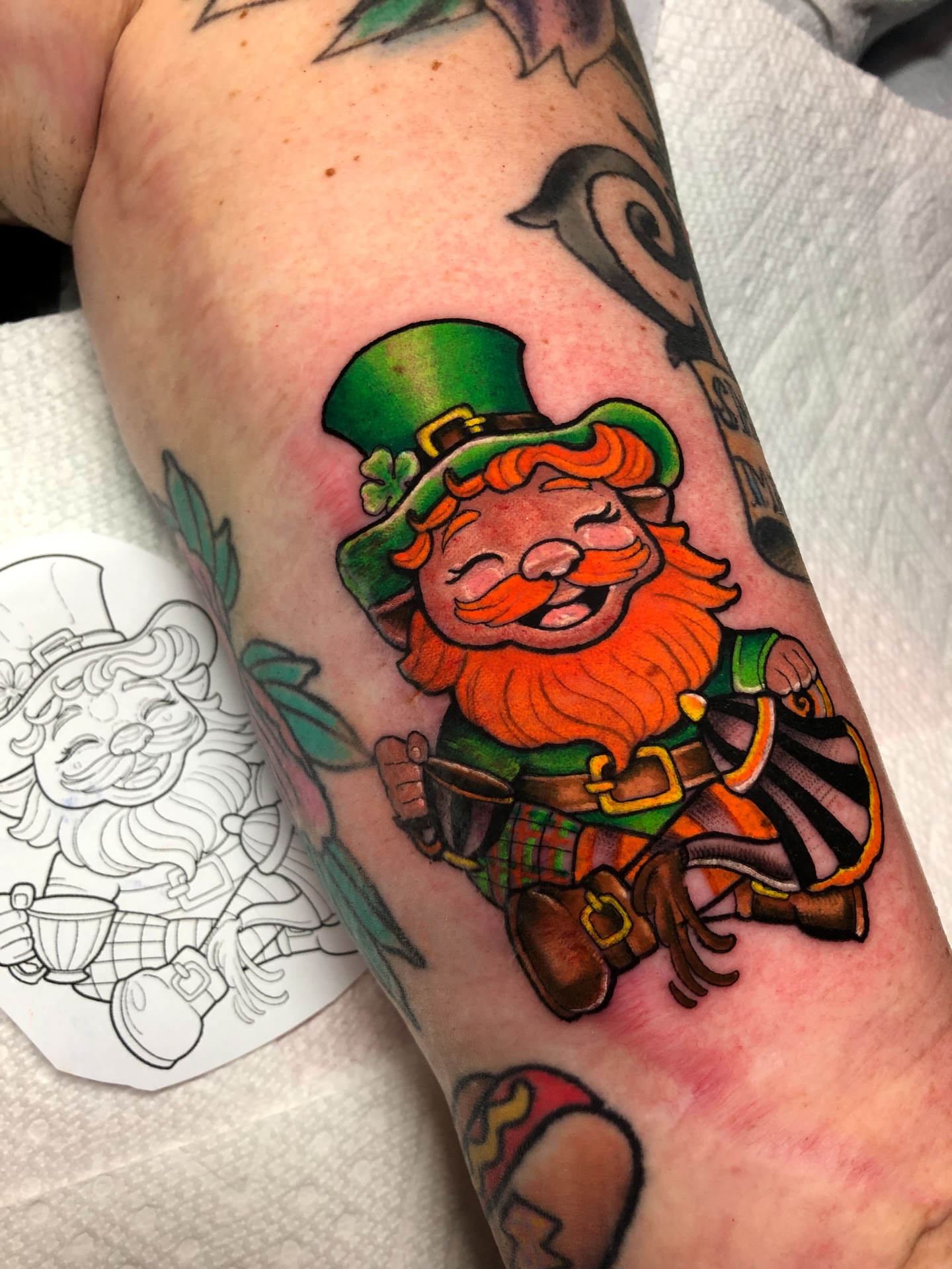Leprechaun new school tattoo on the forearm by Melissa Brown