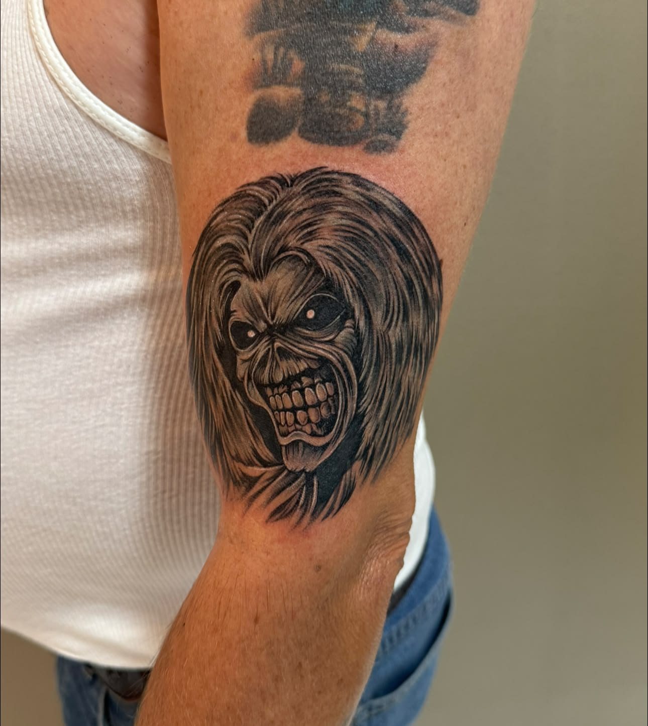Tattoo by @justinrednourtattoo — black_and_grey