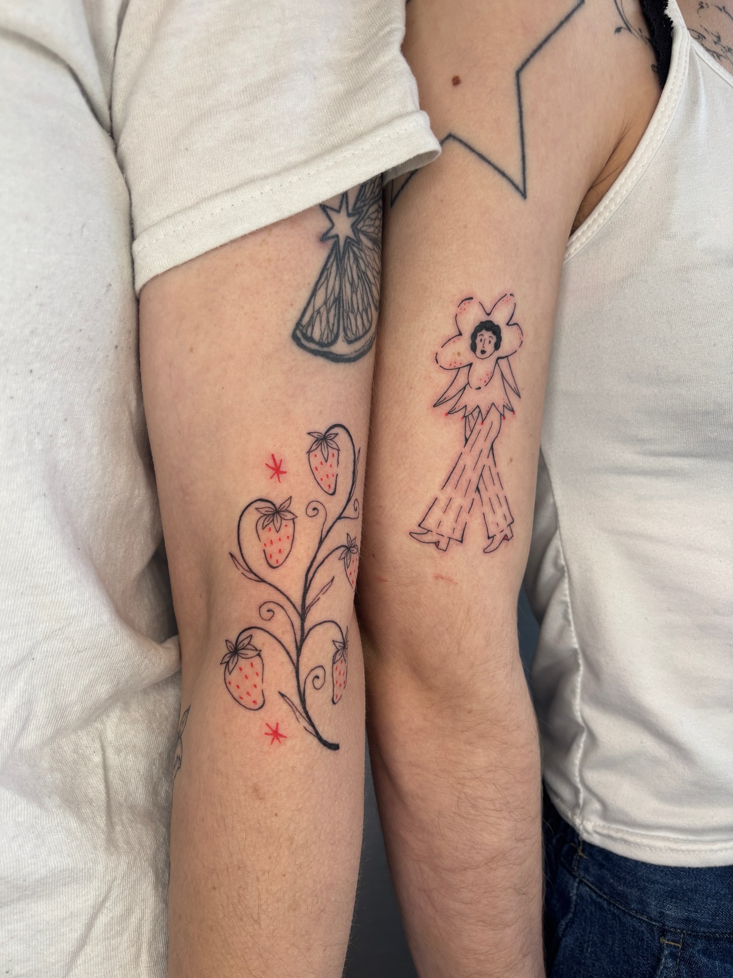 Strawberry plant new school tattoo on the forearm by Raye