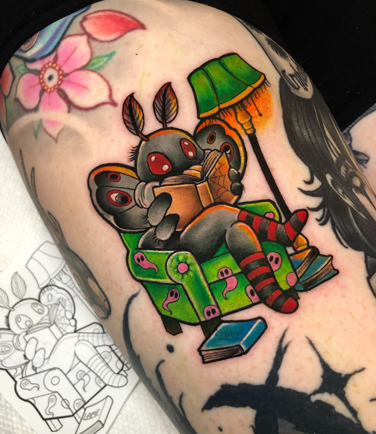 Robot reading book new school tattoo on the thigh by Melissa Brown