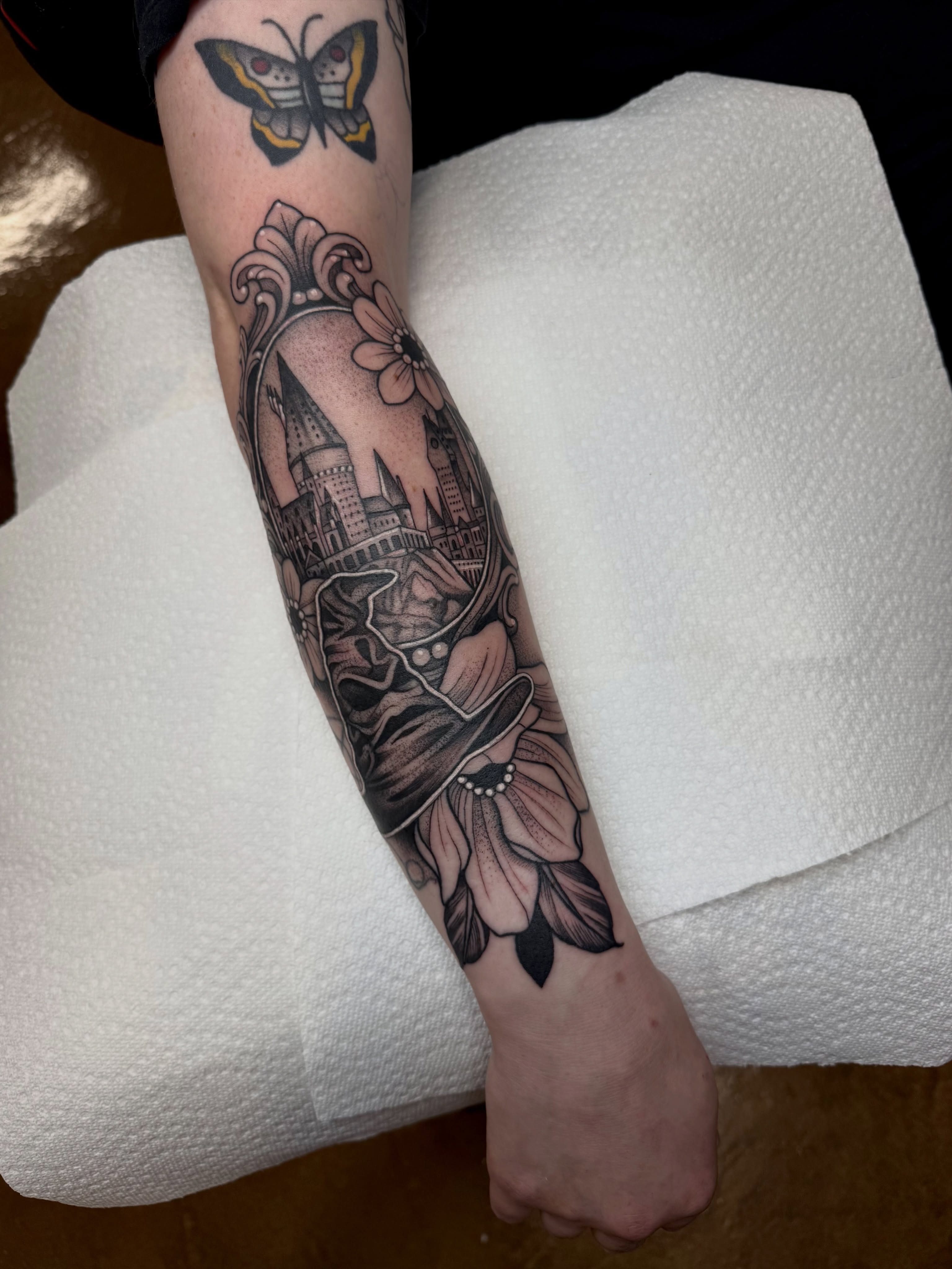Cityscape with flowers American traditional tattoo on the forearm by ⚡️ Krissy Fabis ⚡️