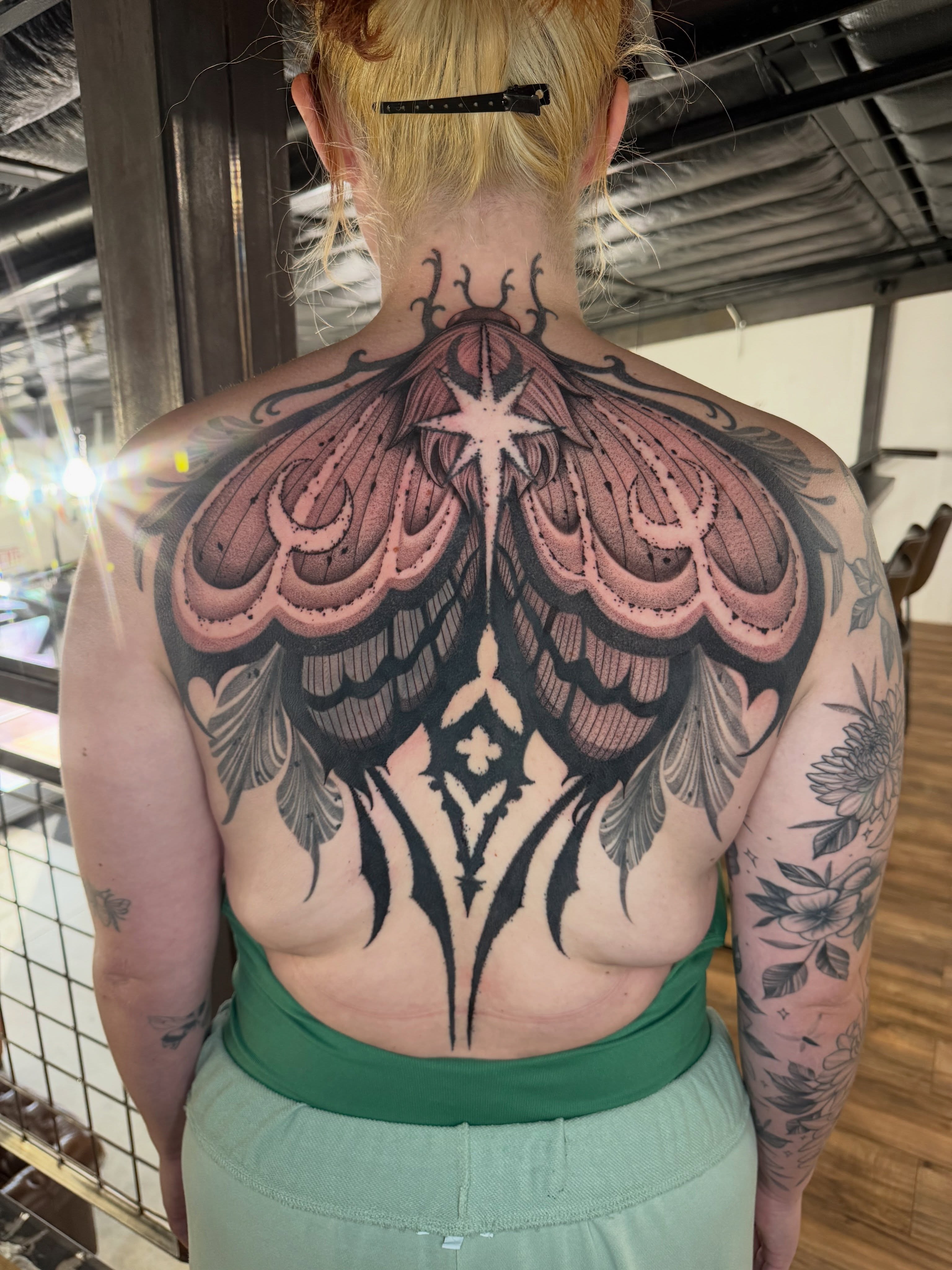 Moth geometric tattoo on the back by πππππ βππ£π£ππ€ππ , Tucson, Arizona