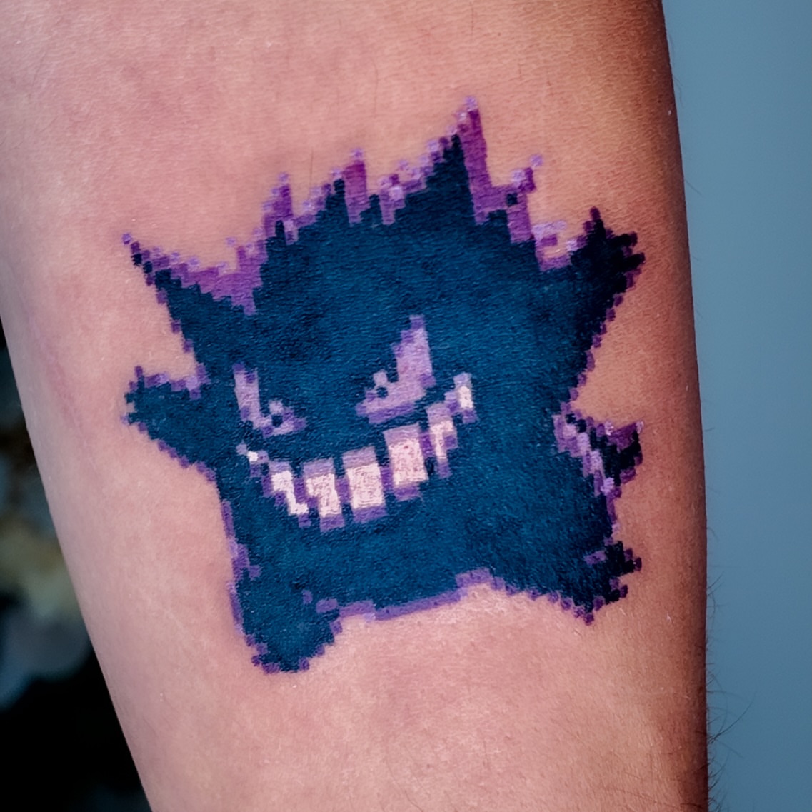 Pixelated ghost tattoo on the forearm by m r p i x e l ๐ธ๐ฌ
