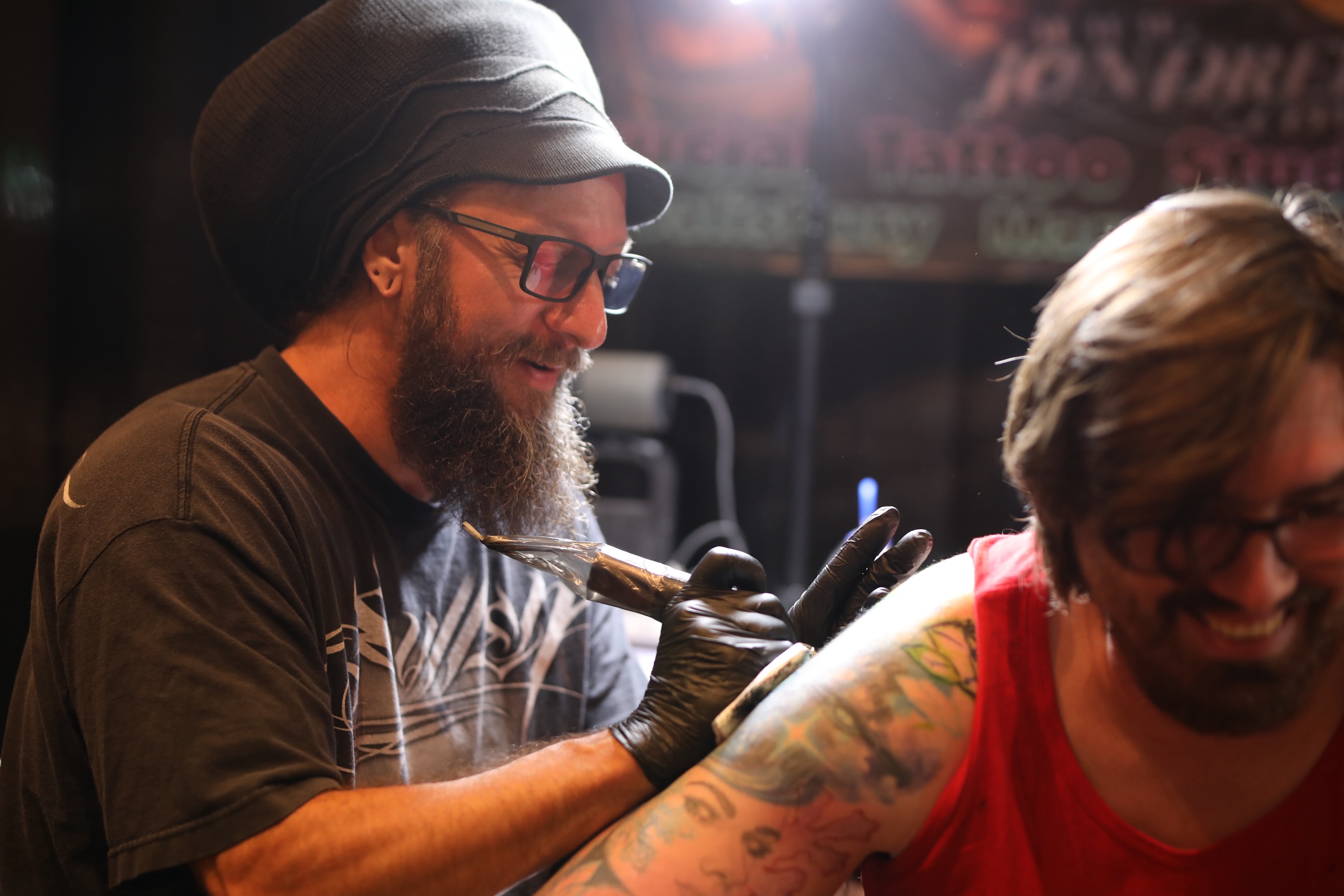 Floral design American traditional tattoo on the upper arm by Durb