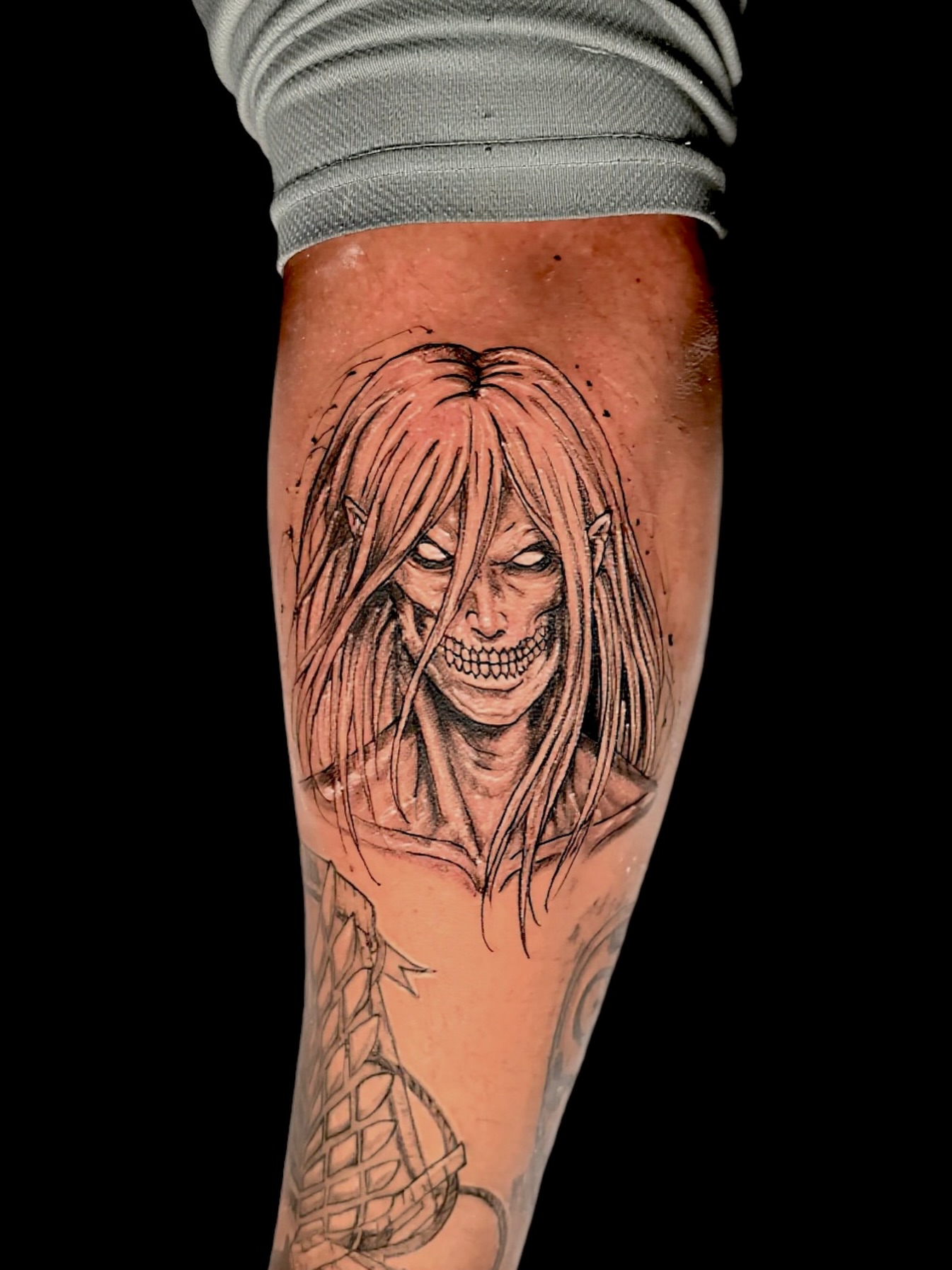 Anime character anime tattoo on the forearm by Junior Sanchez Dfw
