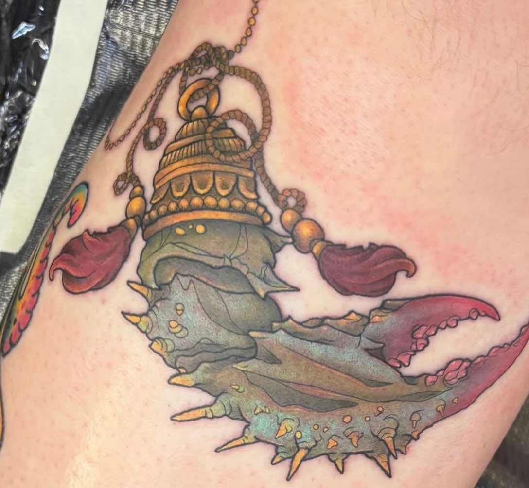 Lobster with bell American traditional tattoo on the thigh by Olivia Buch