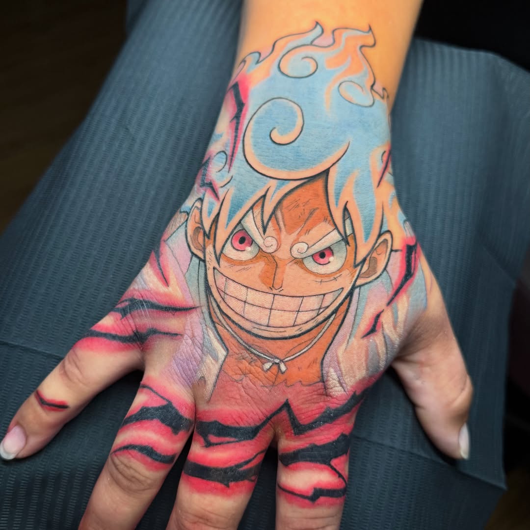 Anime character anime tattoo on the hand by Gilberto Flores Nava