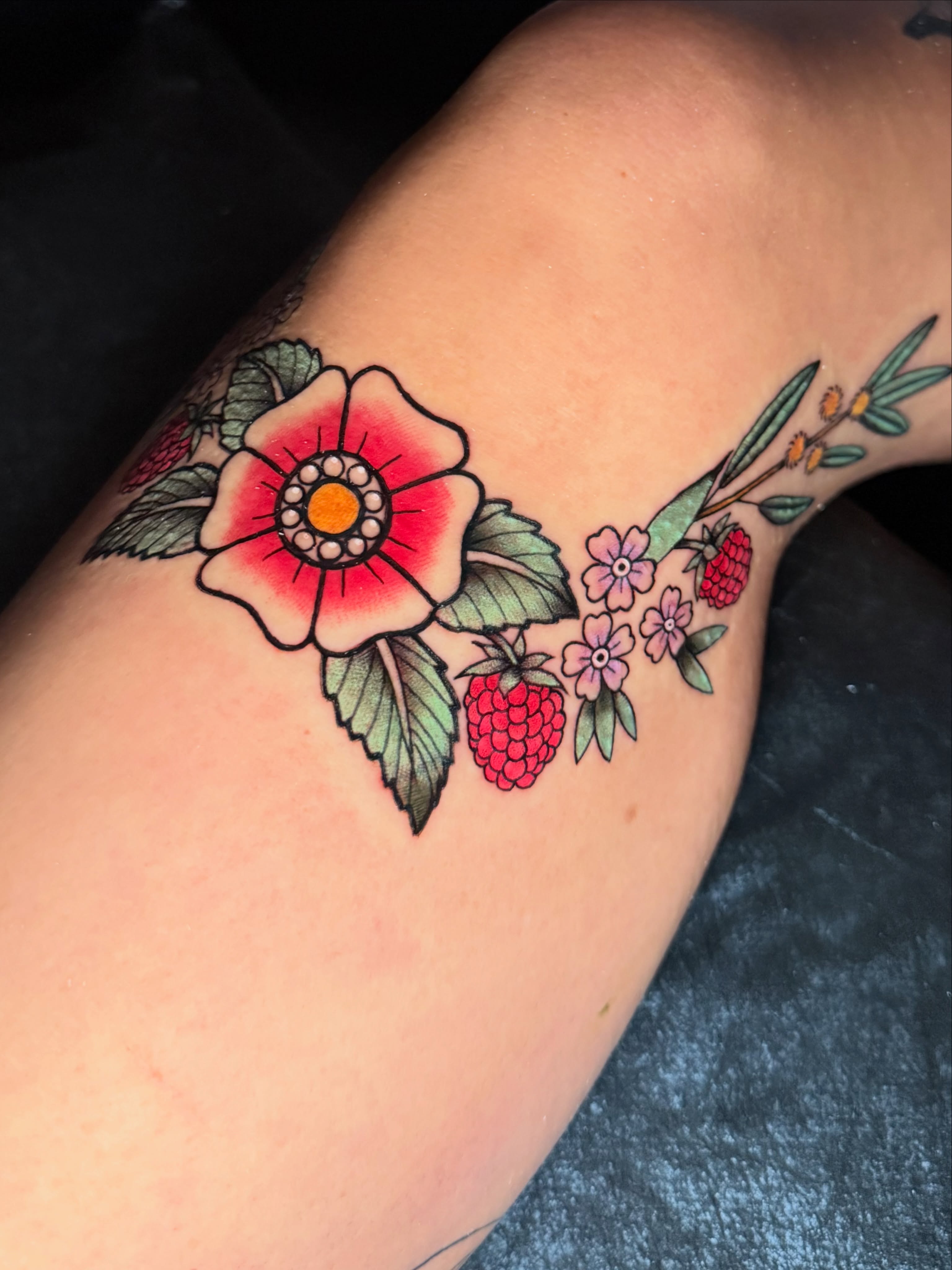 Flower and berries dotwork tattoo on the forearm by Gilberto Flores Nava