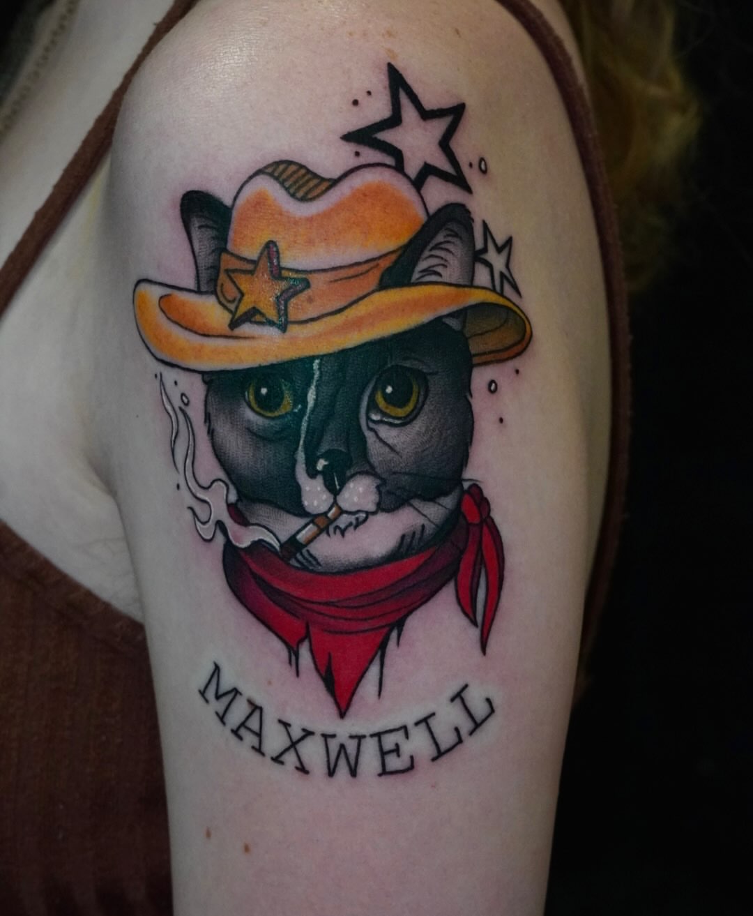 Cat wearing cowboy hat American traditional tattoo on the shoulder by Kalina Lynn