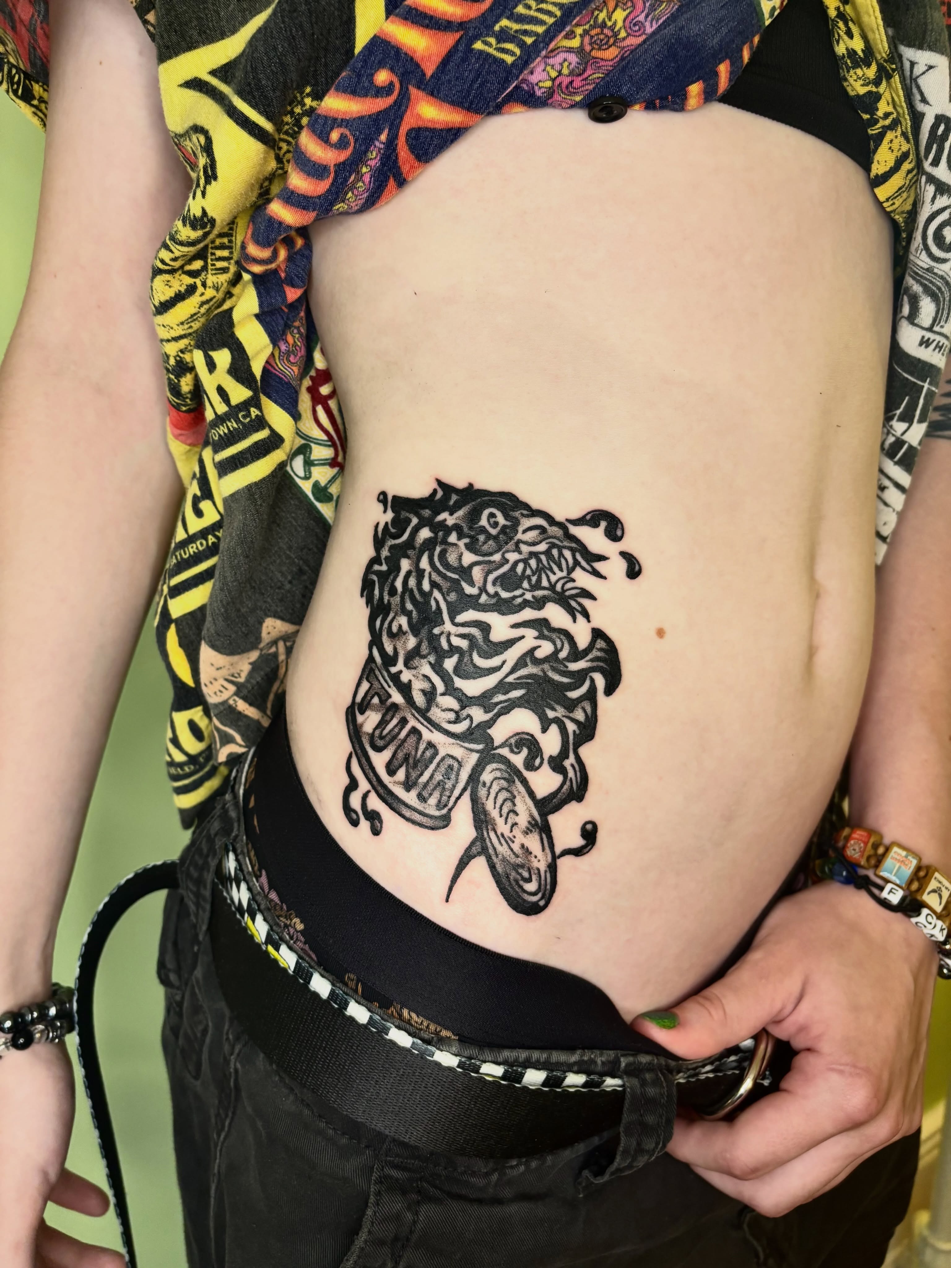 Lion black and grey tattoo on the ribs by Grae