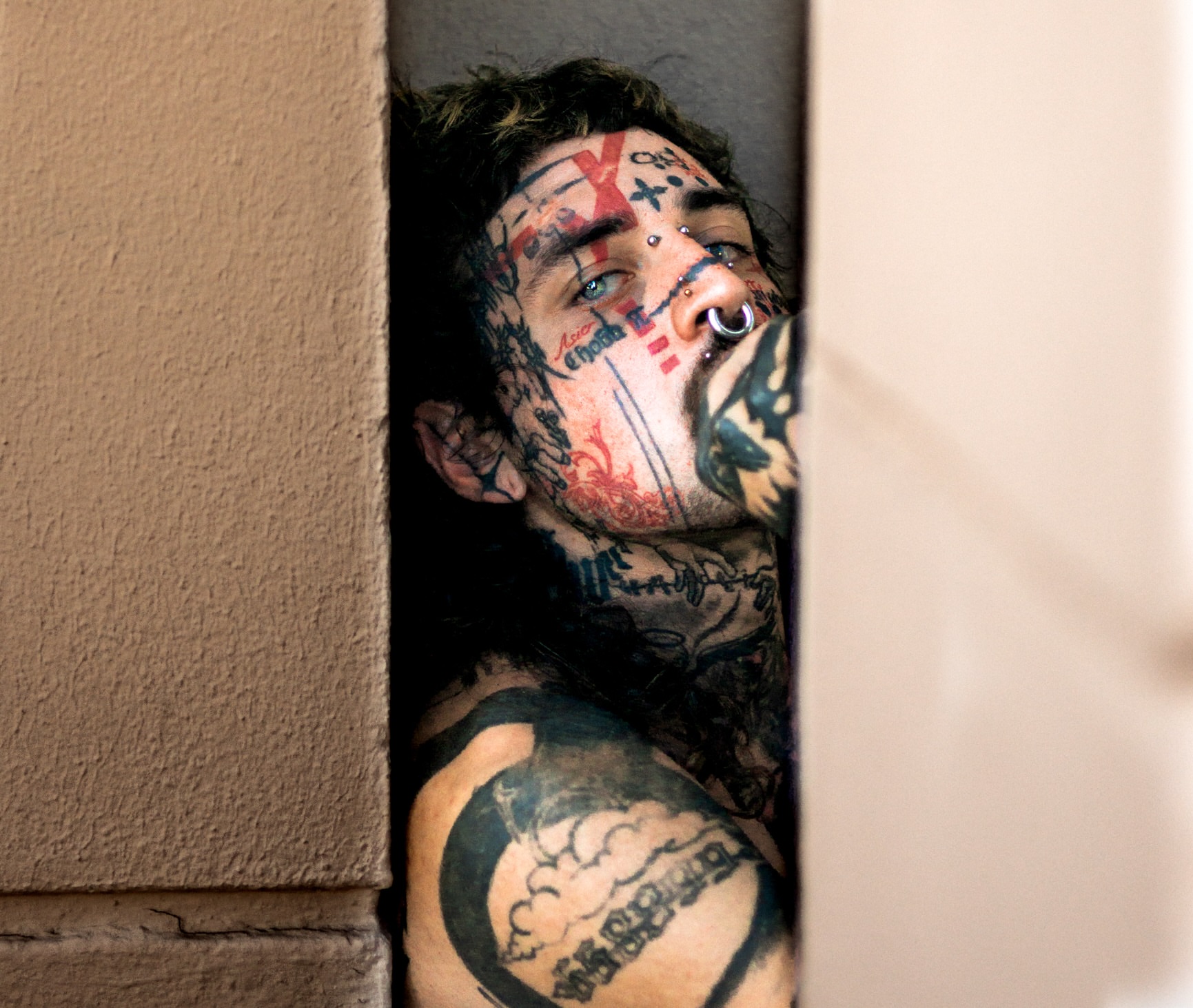 Tattooed face American traditional tattoo by Boise Tattoo Artist