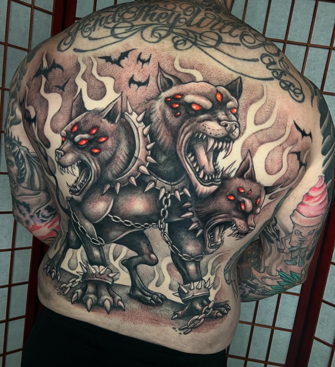 Three chained dogs American traditional tattoo on the back by π·ππ πππππ π·οΈ
