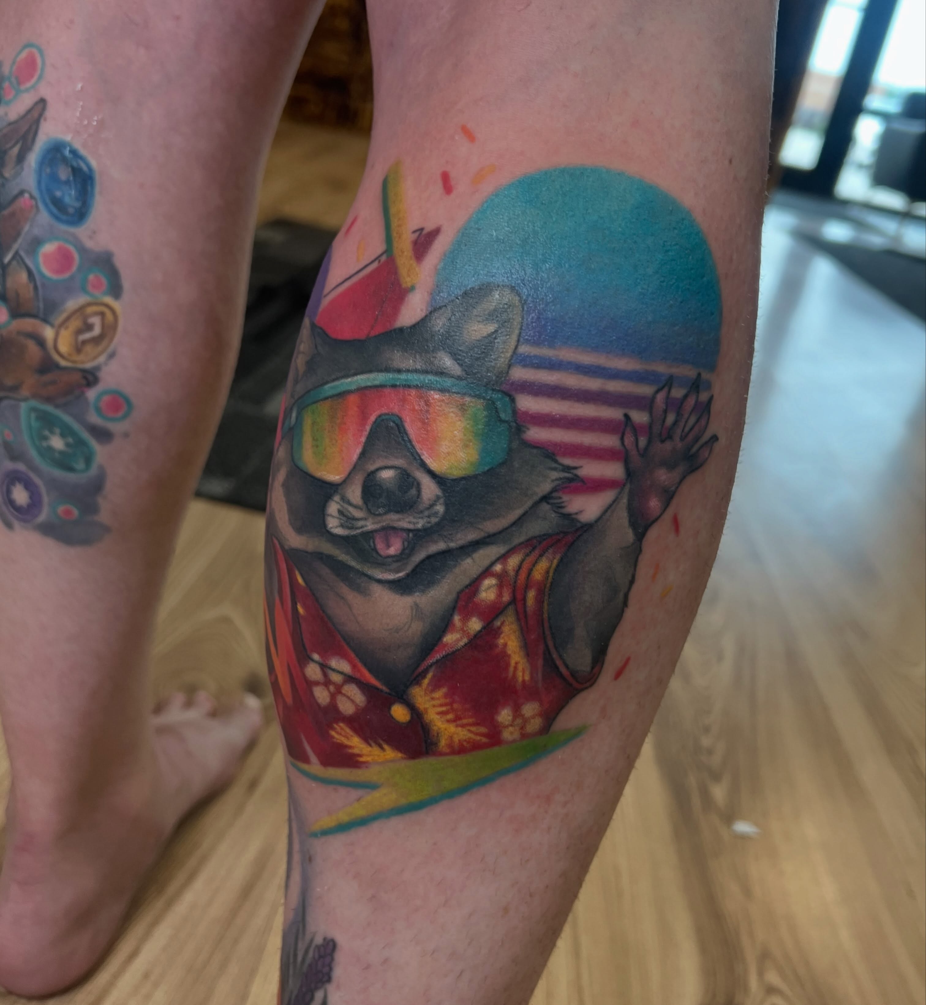 Koala wearing sunglasses new school tattoo on the thigh by Bailey Goodwin, Ankeny, Iowa