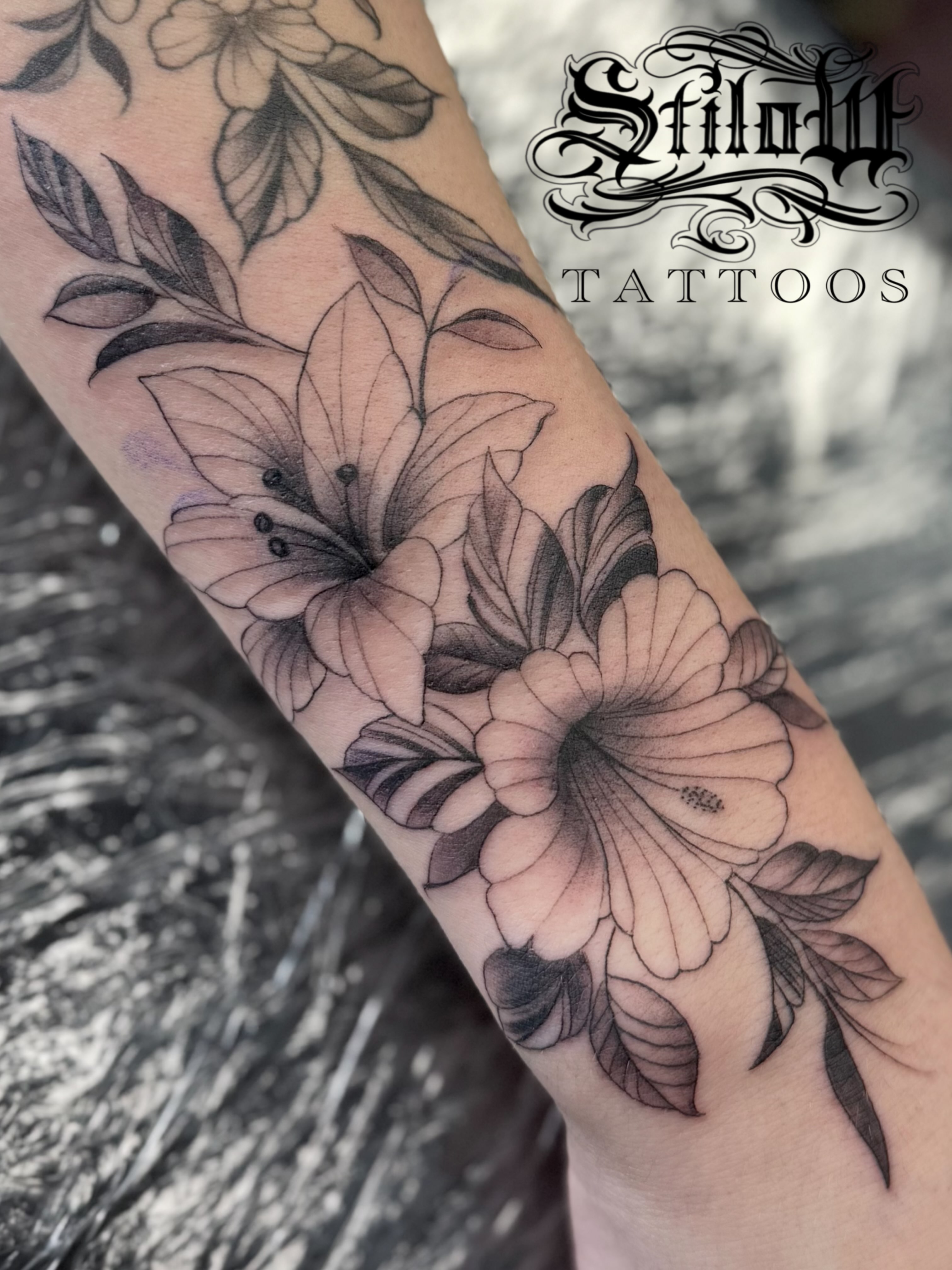 Floral arrangement realism tattoo on the forearm by Stilow Memphis Tattoo Artist, Memphis, Tennessee