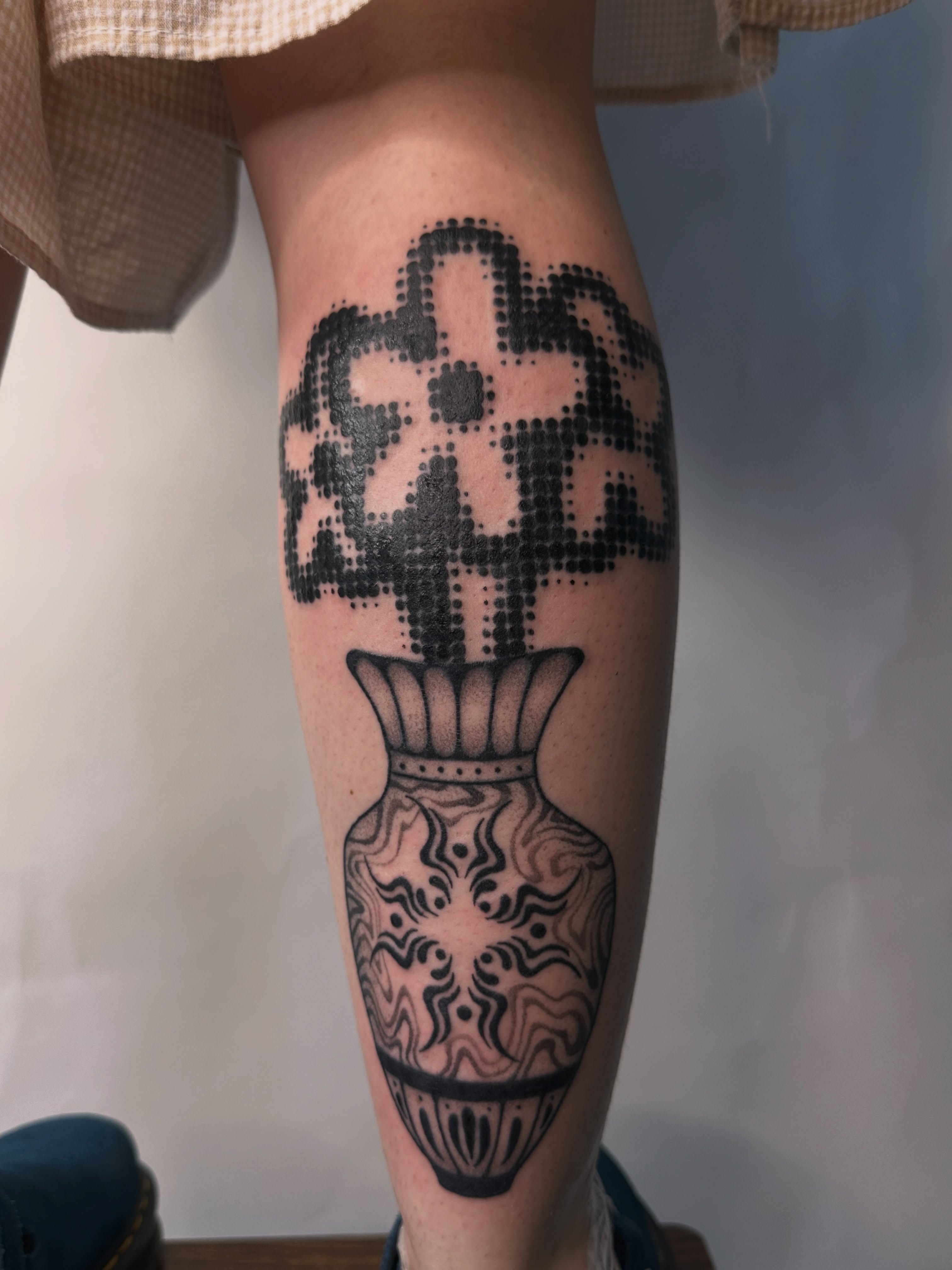 Vase dotwork tattoo on the calf by 𝔠𝔞𝔯𝔯𝔦𝔢