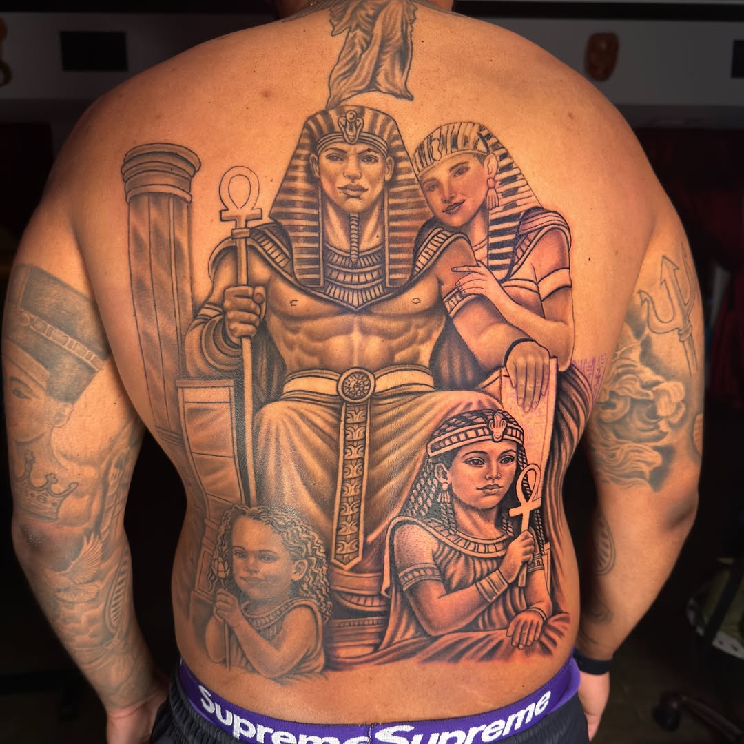 Egyptian family realism tattoo on the back by InkbyEase, Wayne, New Jersey