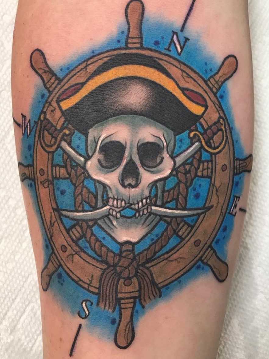 Pirate skull and crossbones American traditional tattoo on the forearm by Alex
