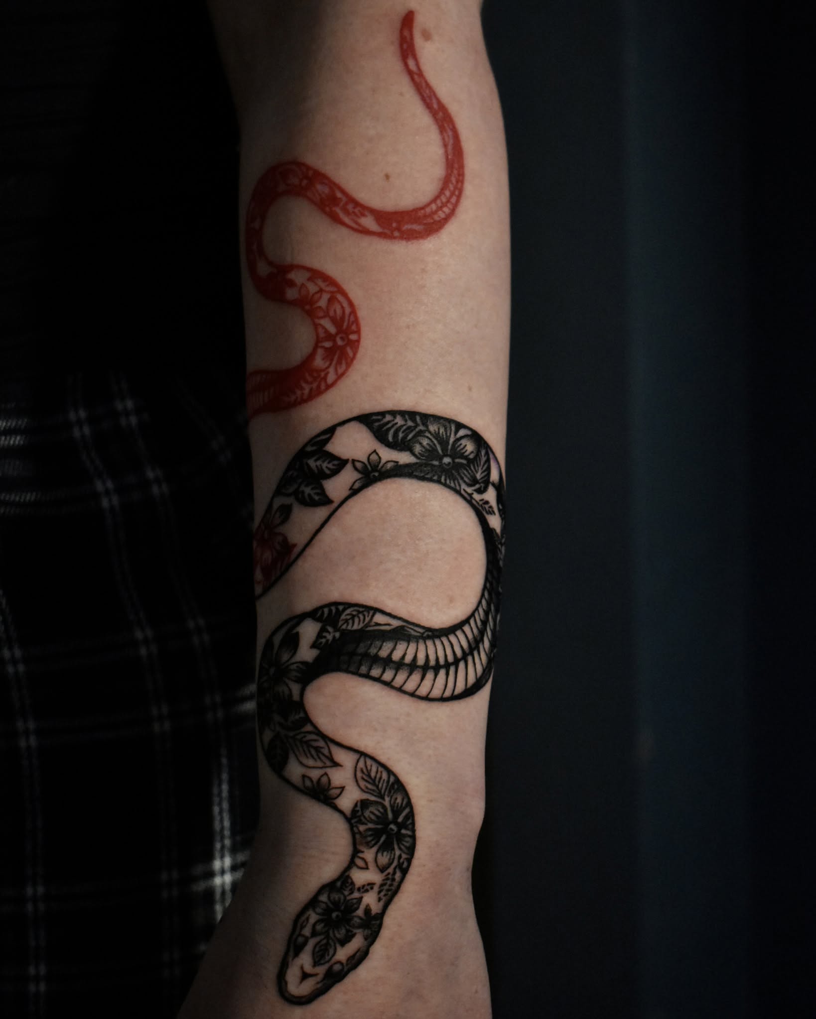 Snake black and grey tattoo on the forearm by Mackz
