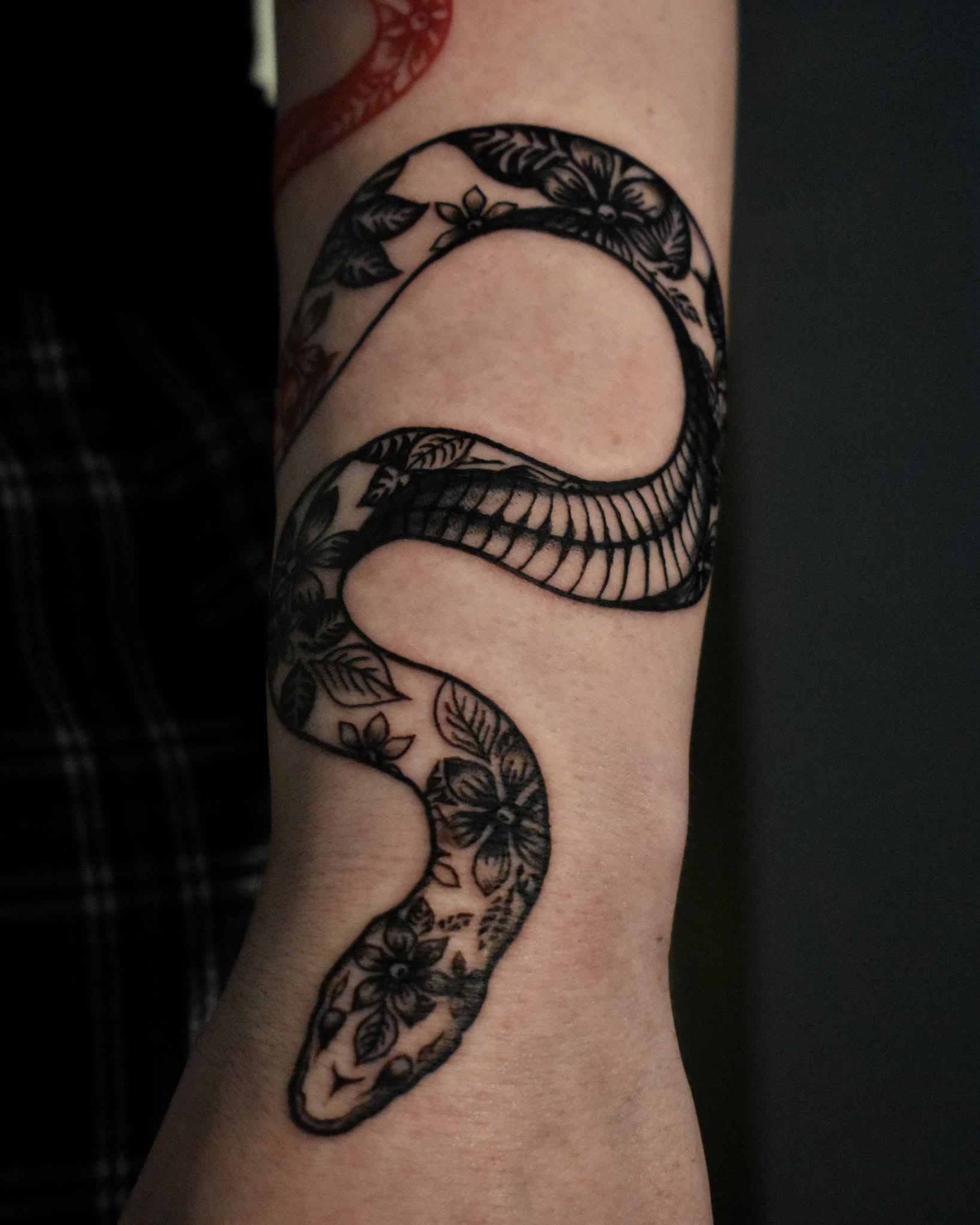 Snake black and grey tattoo on the forearm by Mackz
