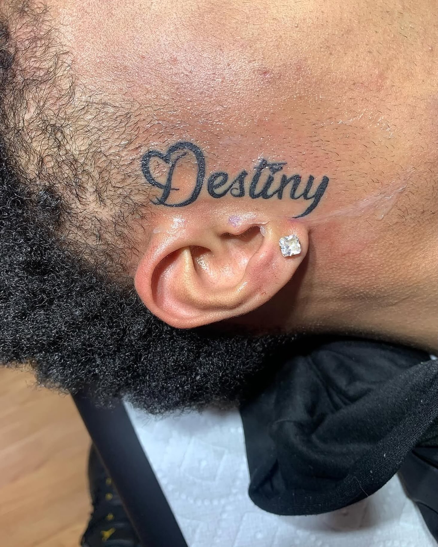 Destiny lettering script tattoo on the neck by Inkby_larry