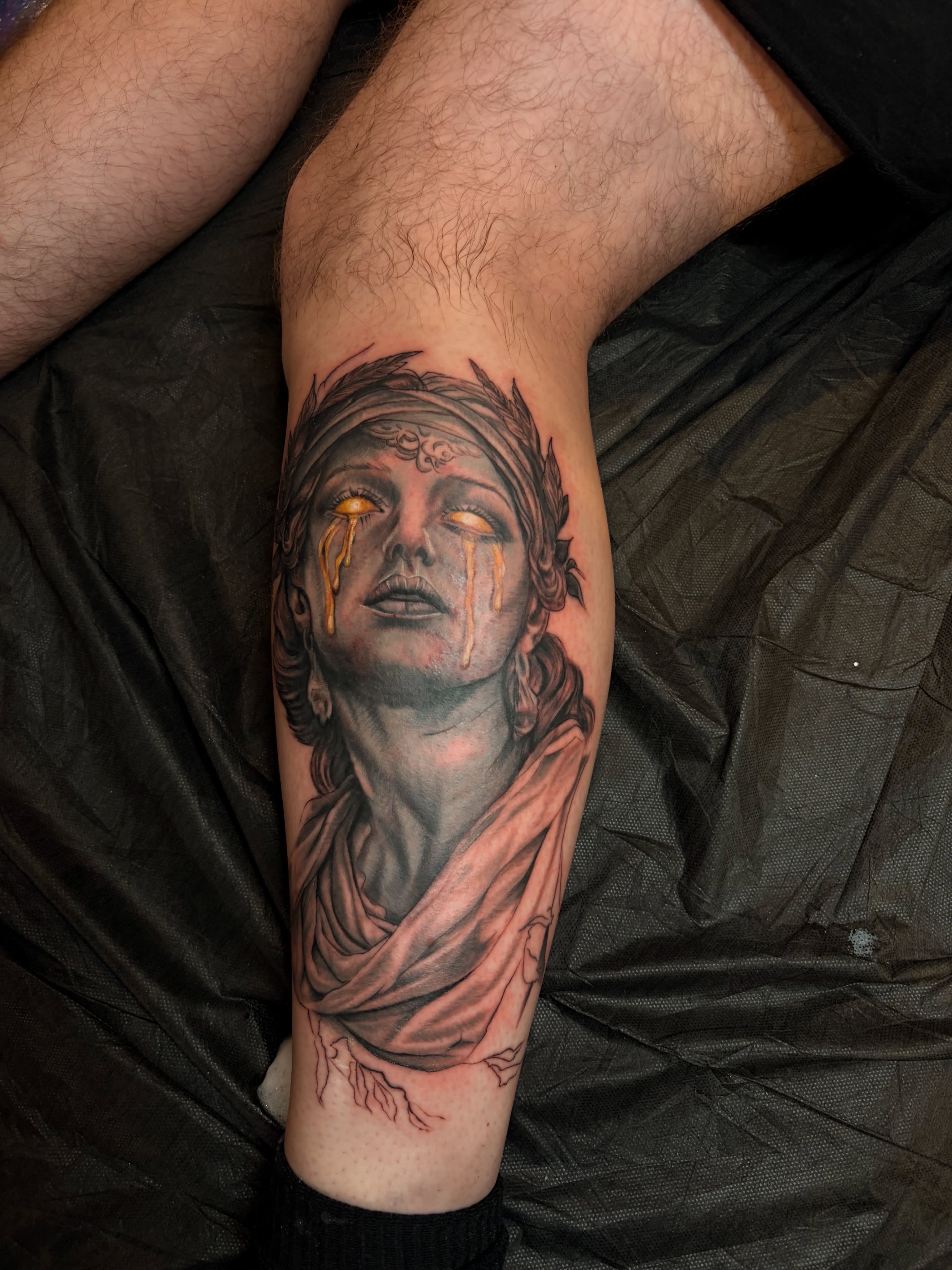 Woman with tears realism tattoo on the forearm by Inked By E, Philadelphia, Pennsylvania