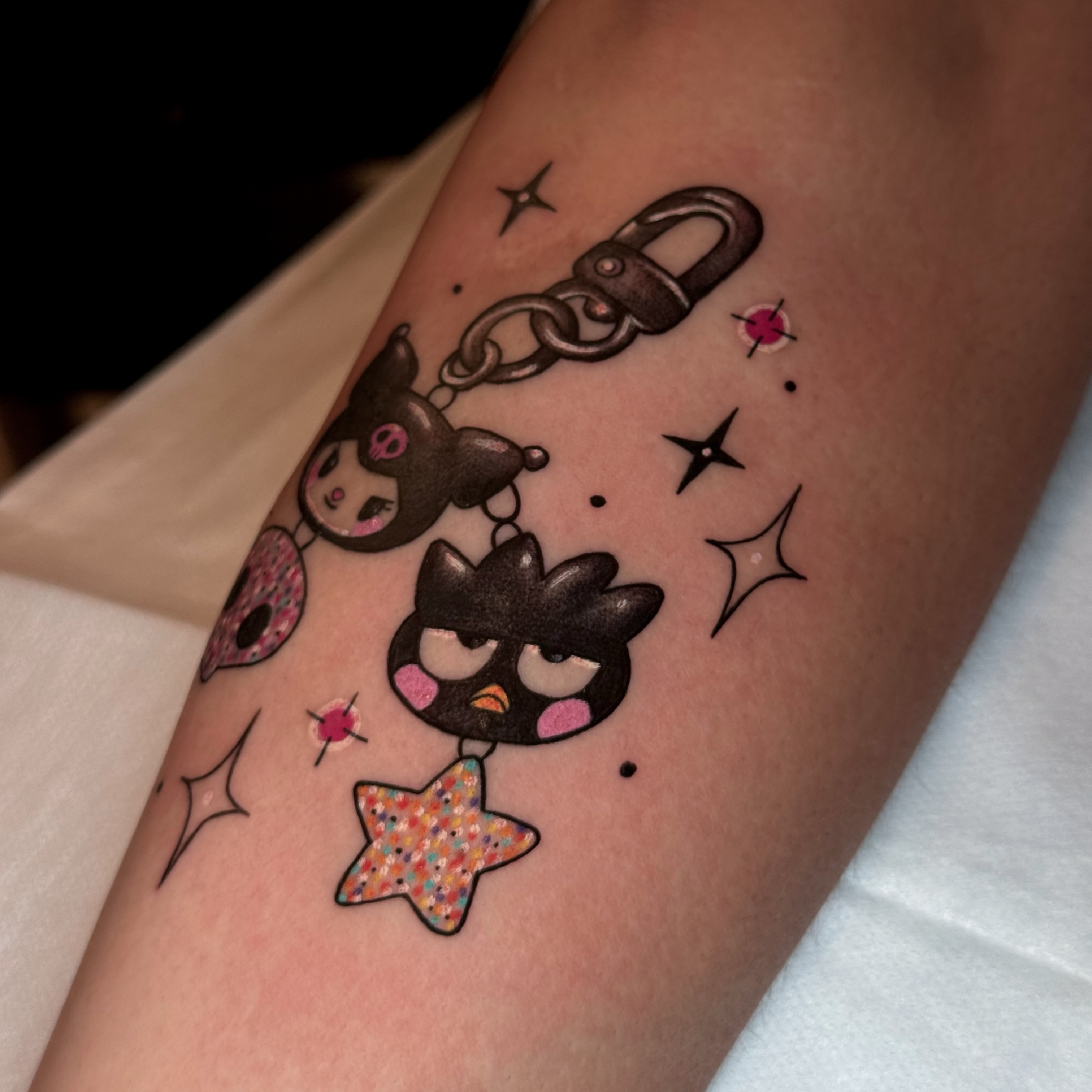 Kawaii characters anime tattoo on the forearm by Alexia