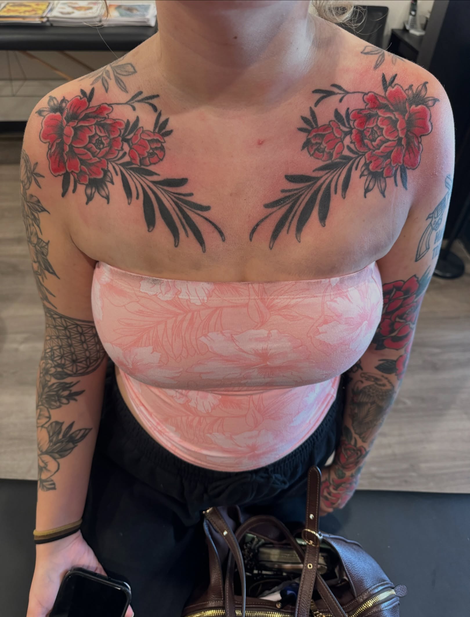 Peony flowers American traditional tattoo on the chest by Minneapolis